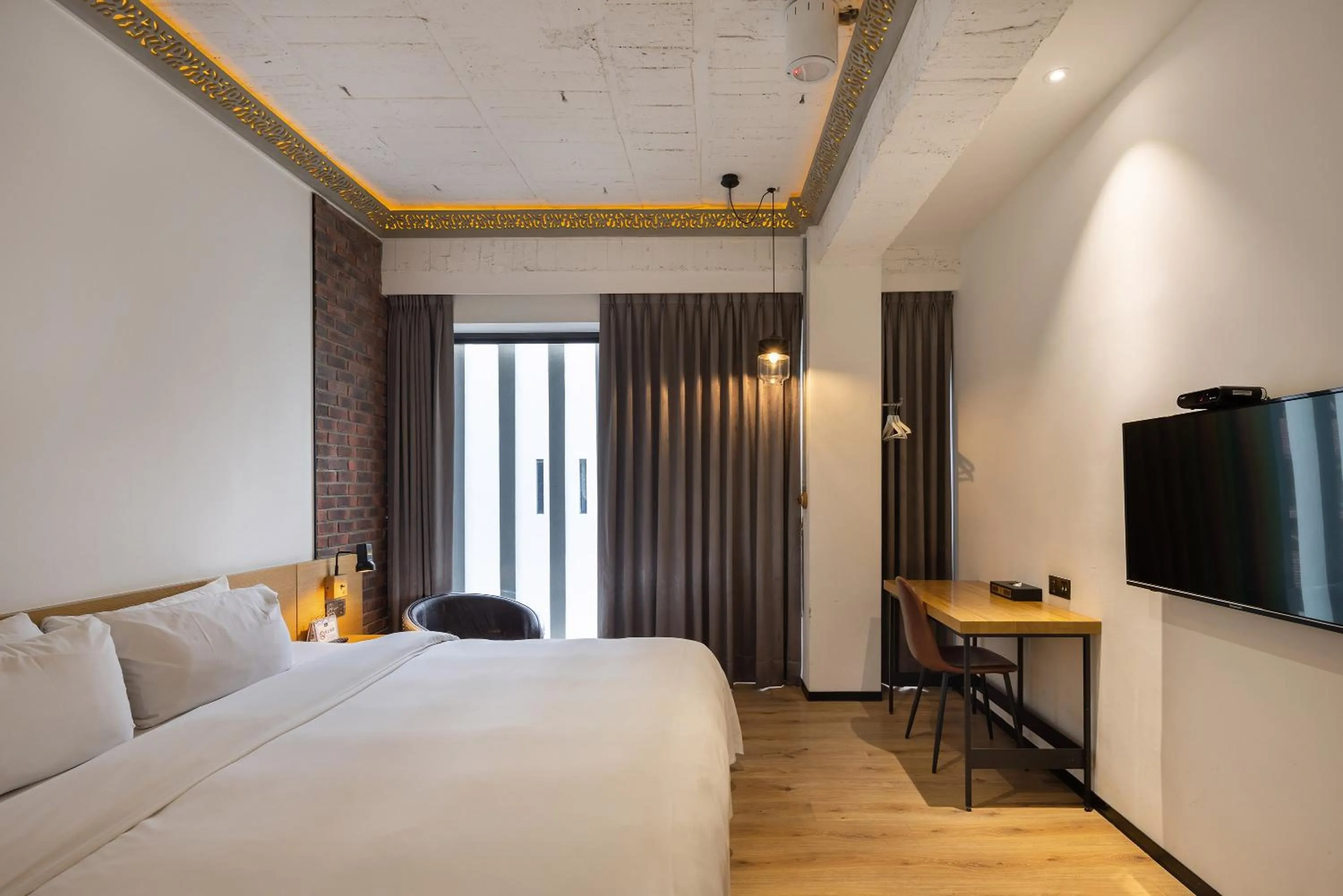 Bed in BlueSky Hotel