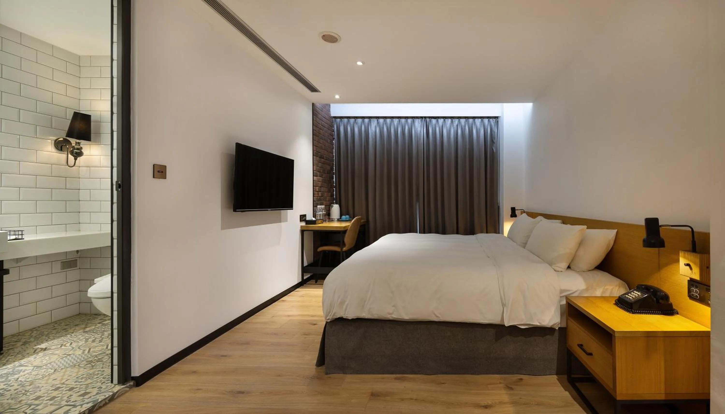 Bed in BlueSky Hotel