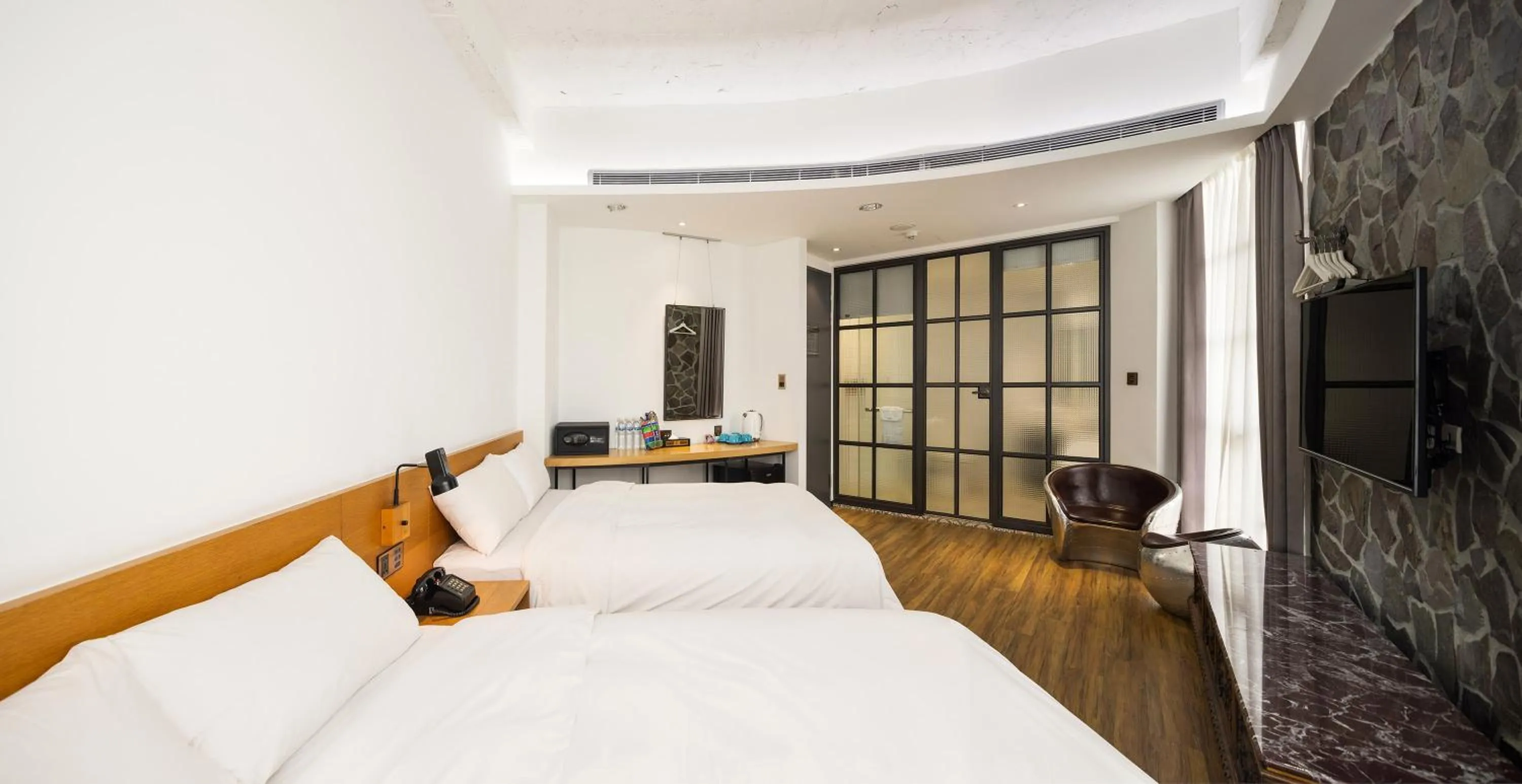 Bed in BlueSky Hotel