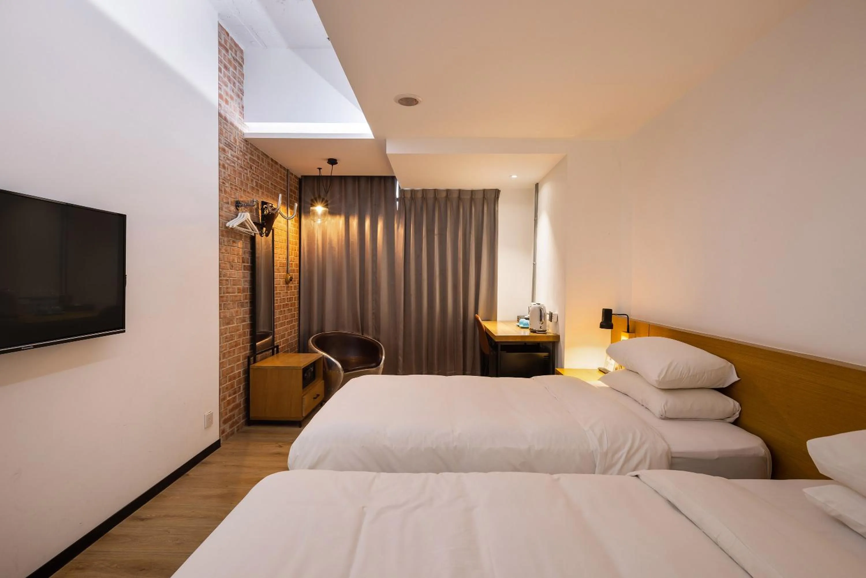 Bed in BlueSky Hotel