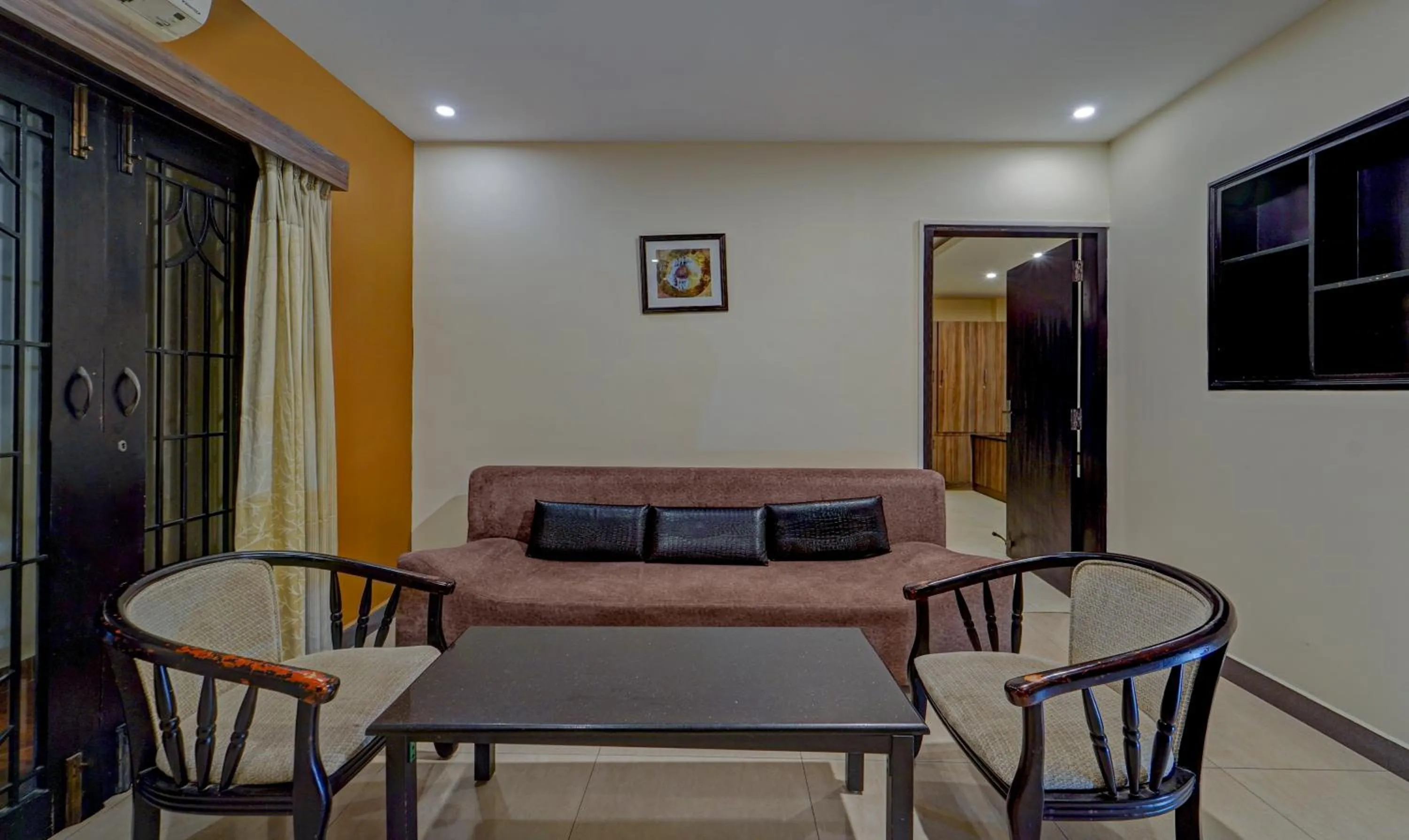 Living room in Treebo Elan