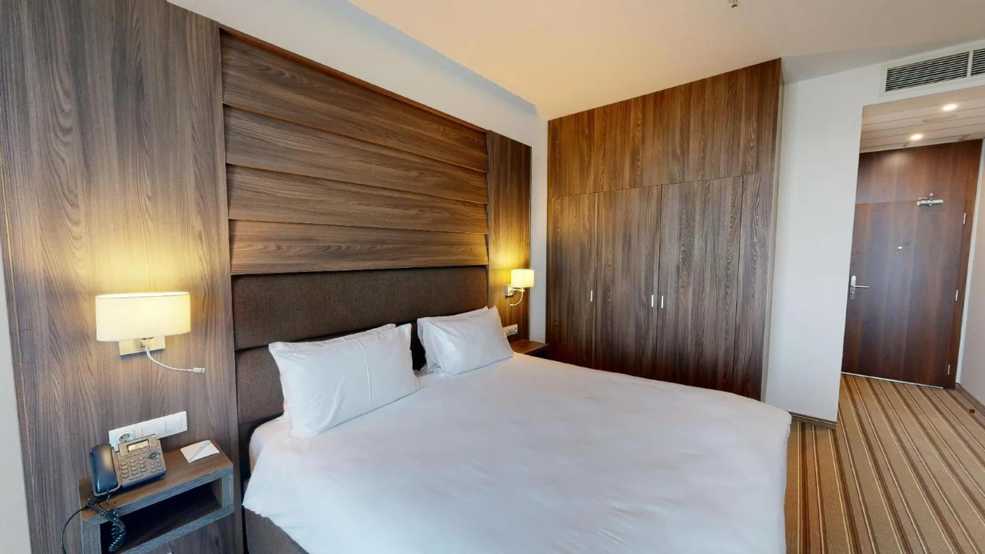 Bed in Premier Sofia Airport Hotel