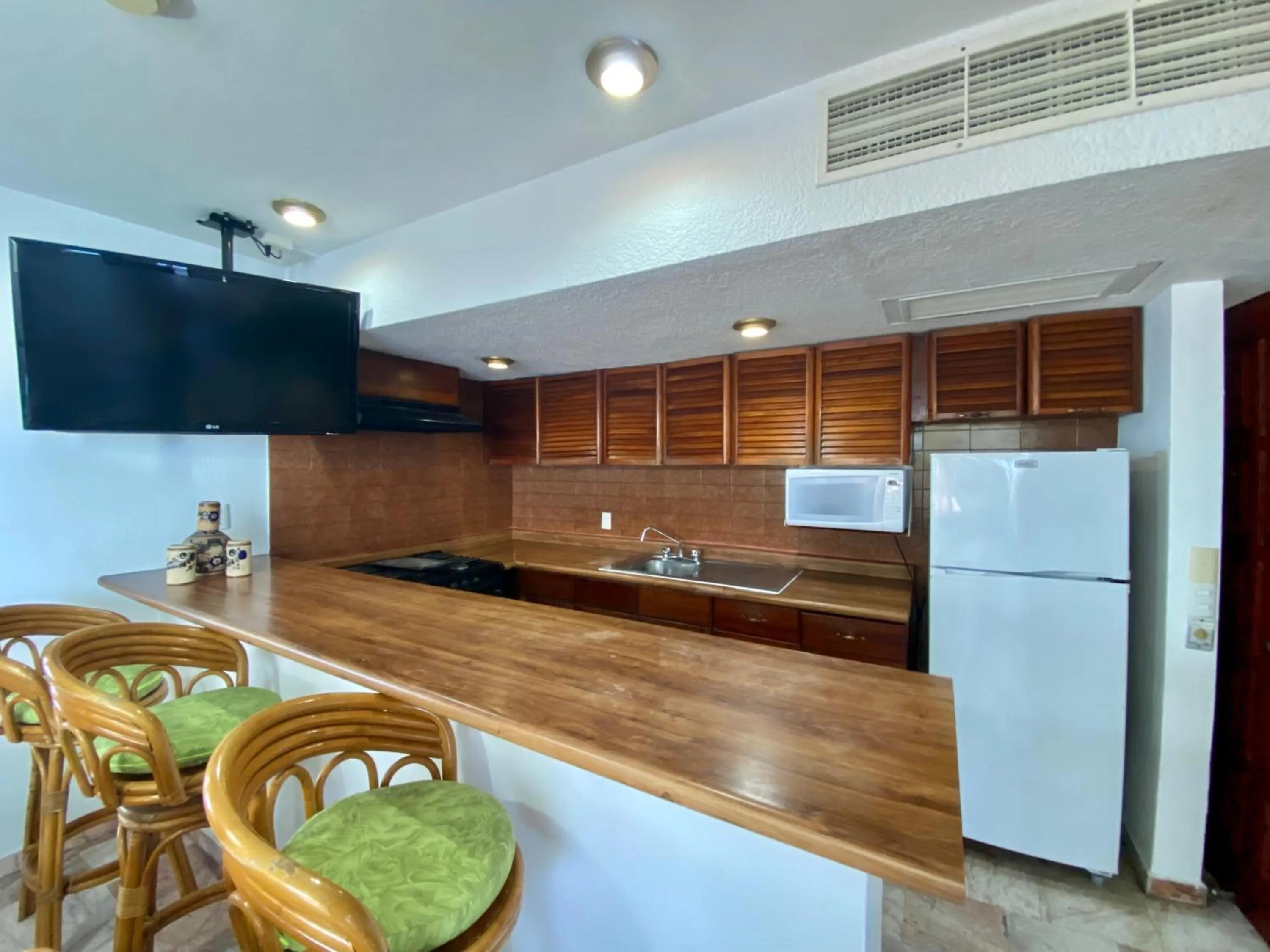 Kitchen or kitchenette in Costa Sur Resort & Spa