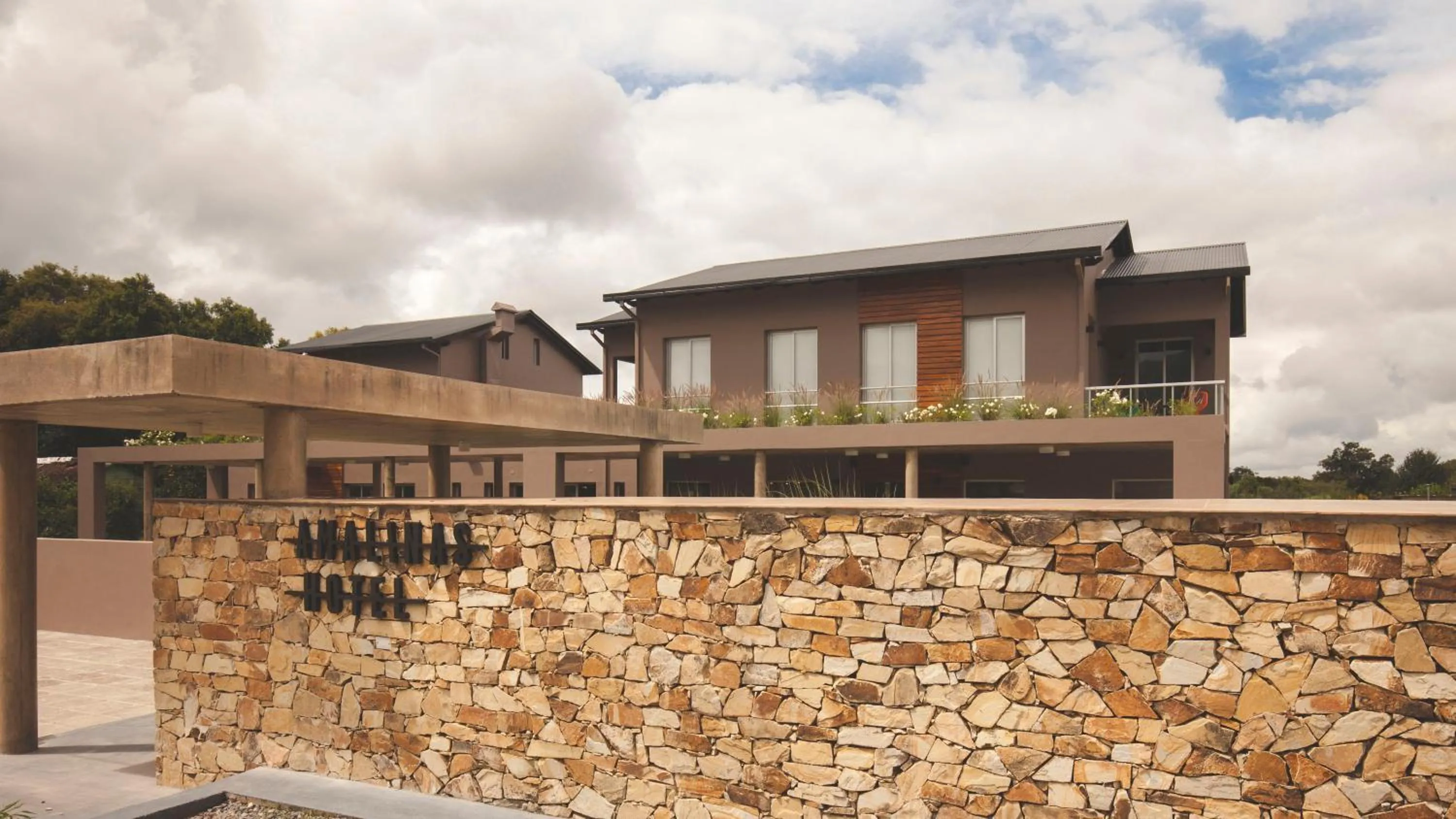 Property logo or sign in Amalinas Hotel