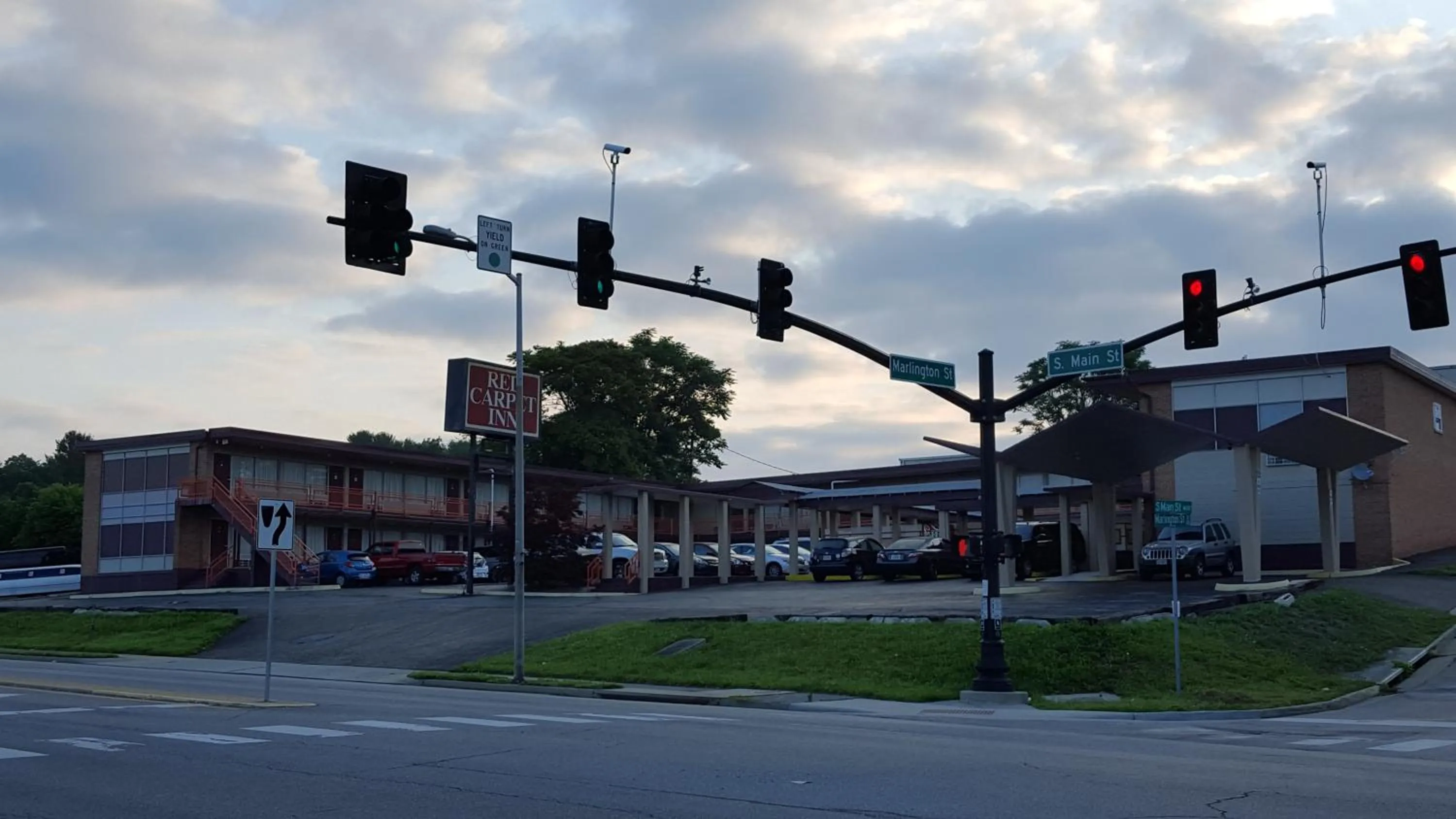 Property logo or sign in Red Carpet Inn - Blacksburg