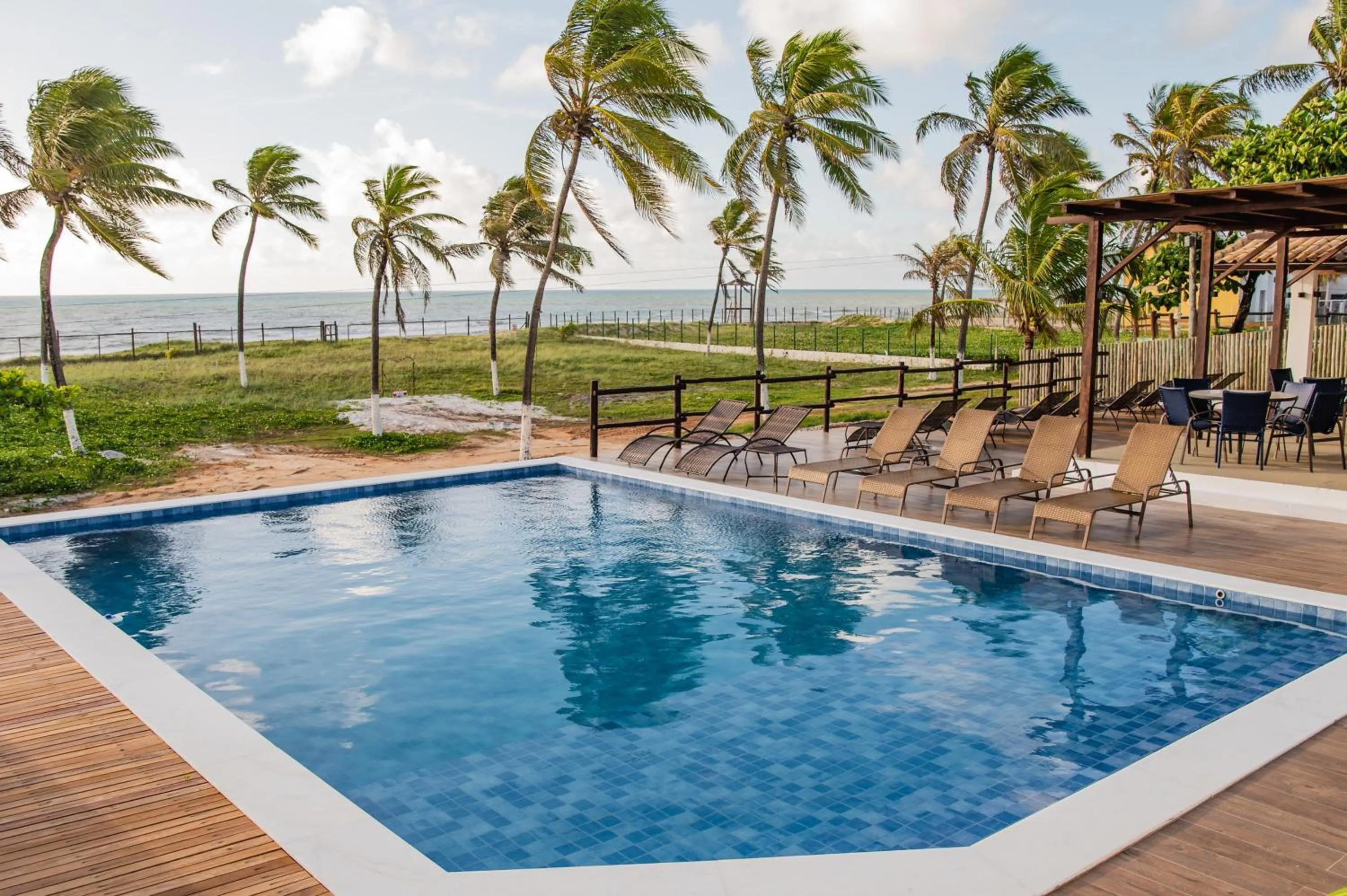 Swimming pool in Pousada Aldeola by Slaviero Hotéis