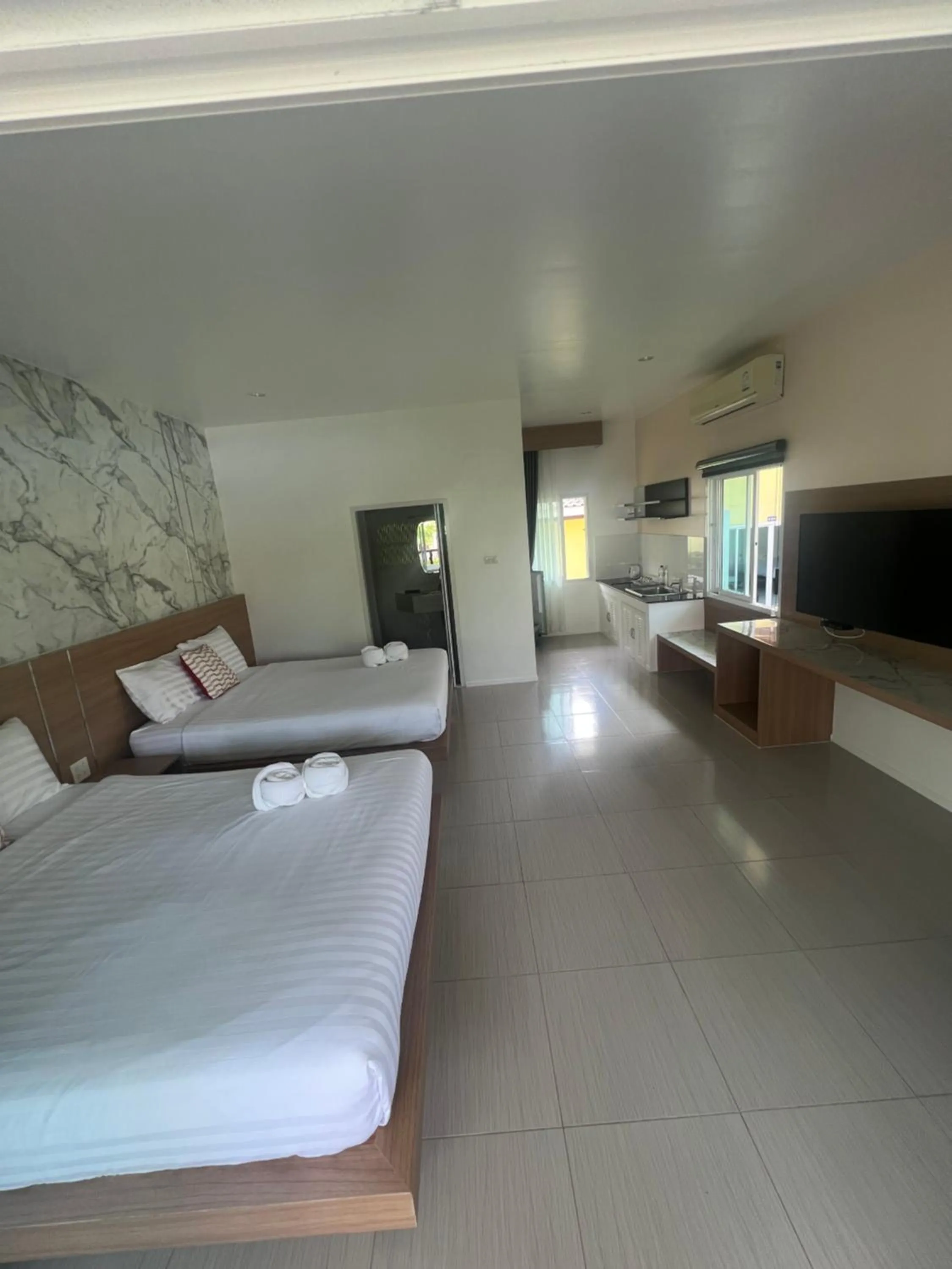 Bed in Thipburee Resort