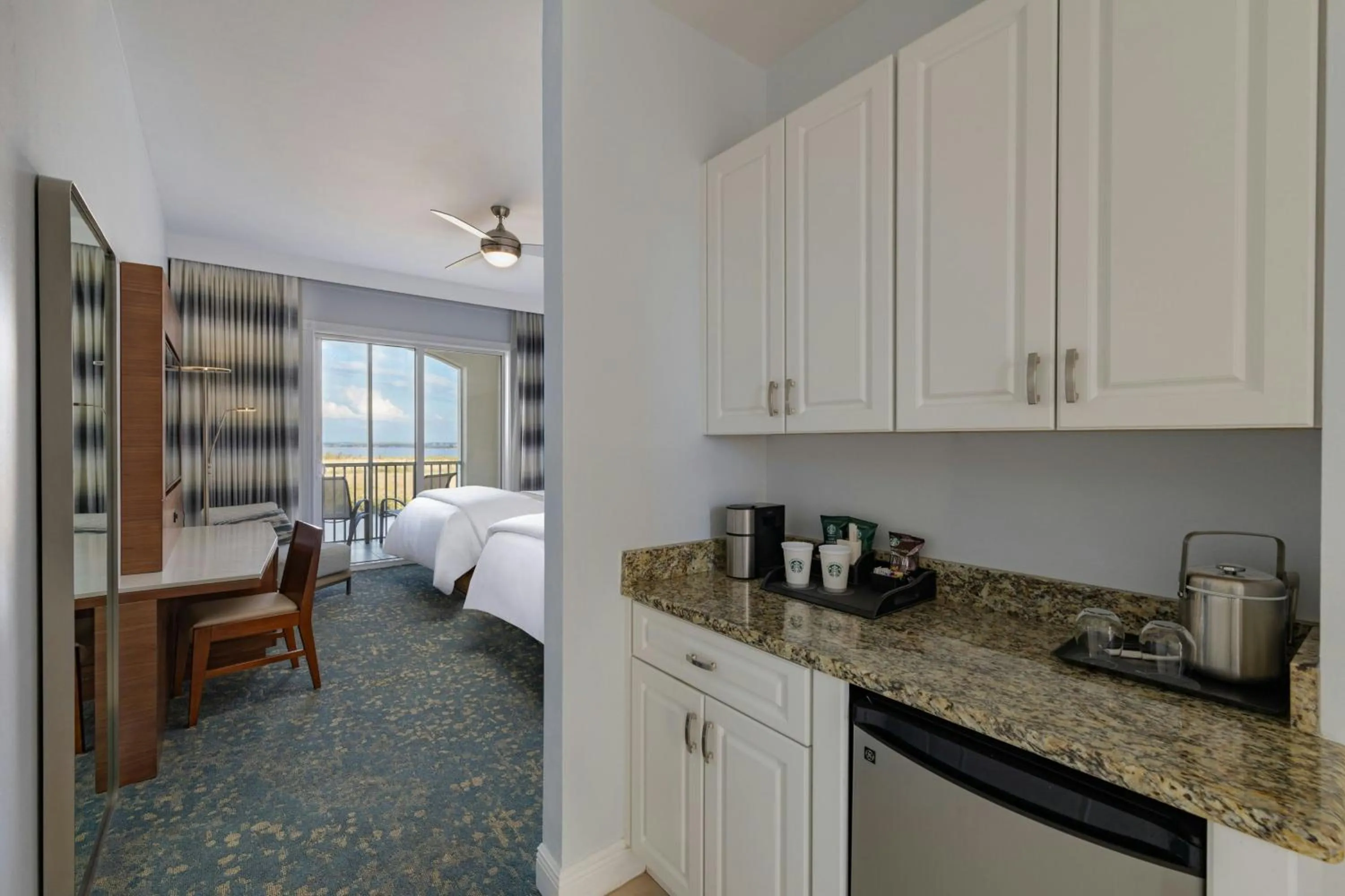 Kitchen or kitchenette, Bed in The Westin Cape Coral Resort at Marina Village