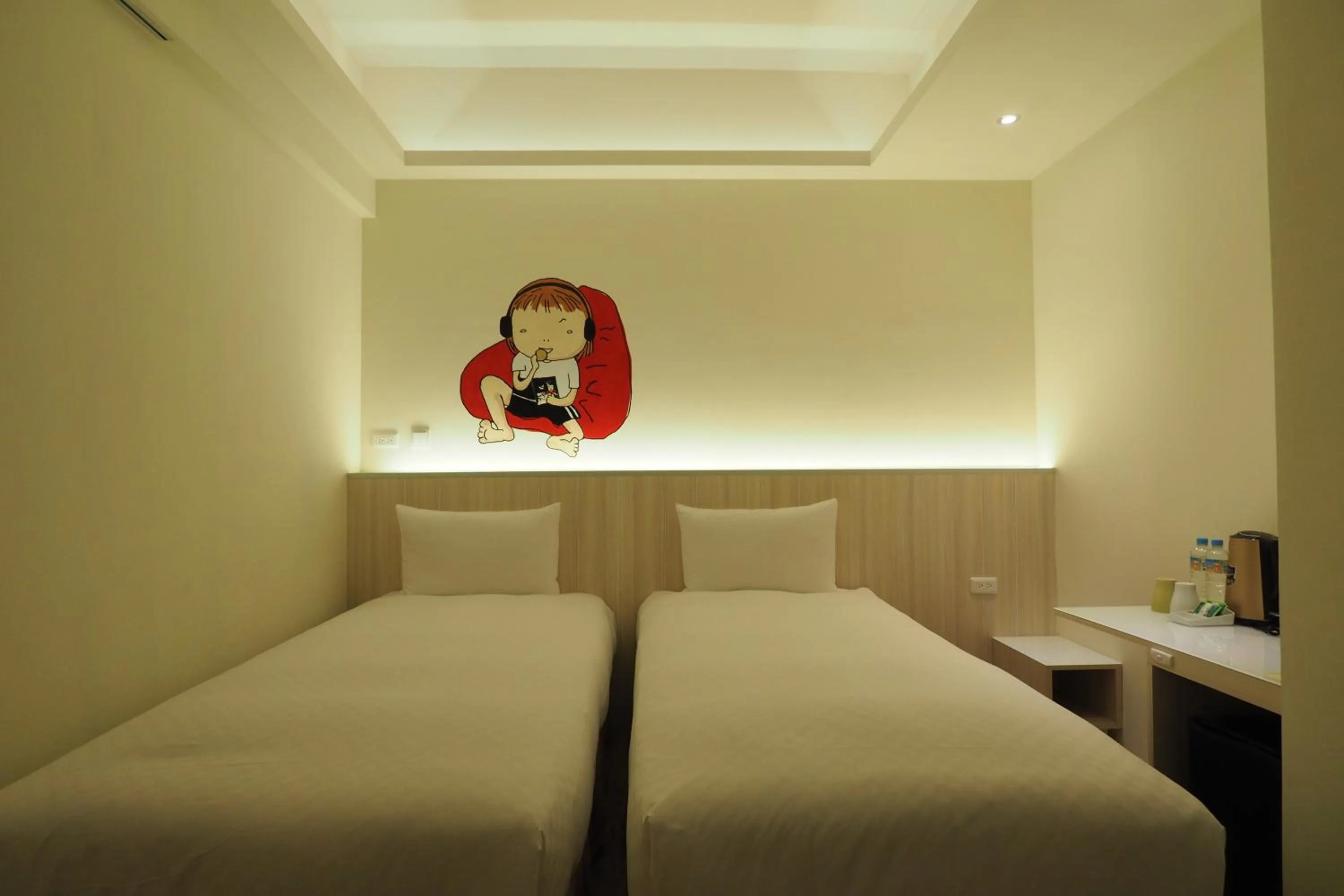 Photo of the whole room, Bed in M Hotel