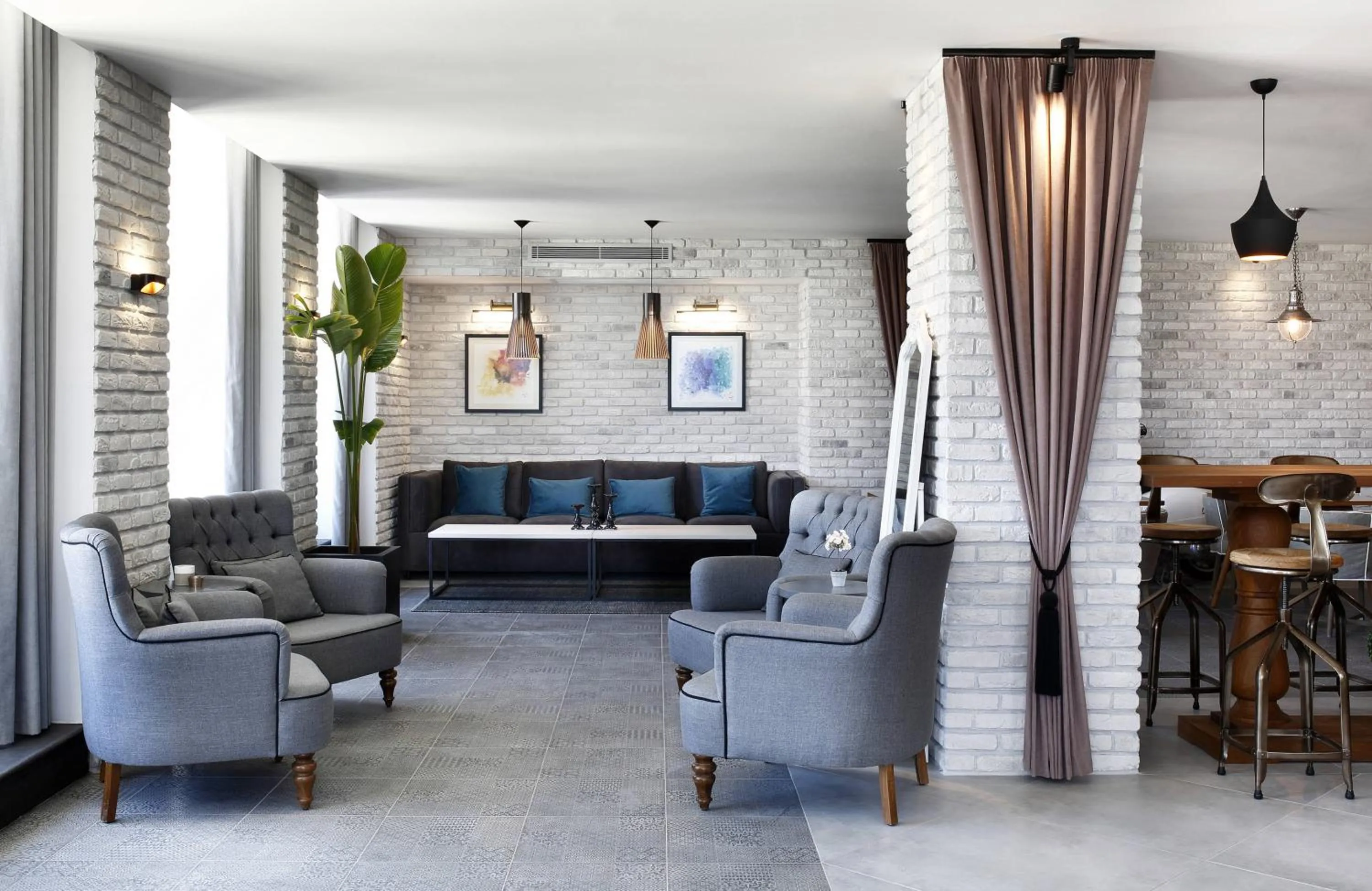 Communal lounge/ TV room in Alacatı Port Ladera Hotel - Adult Only