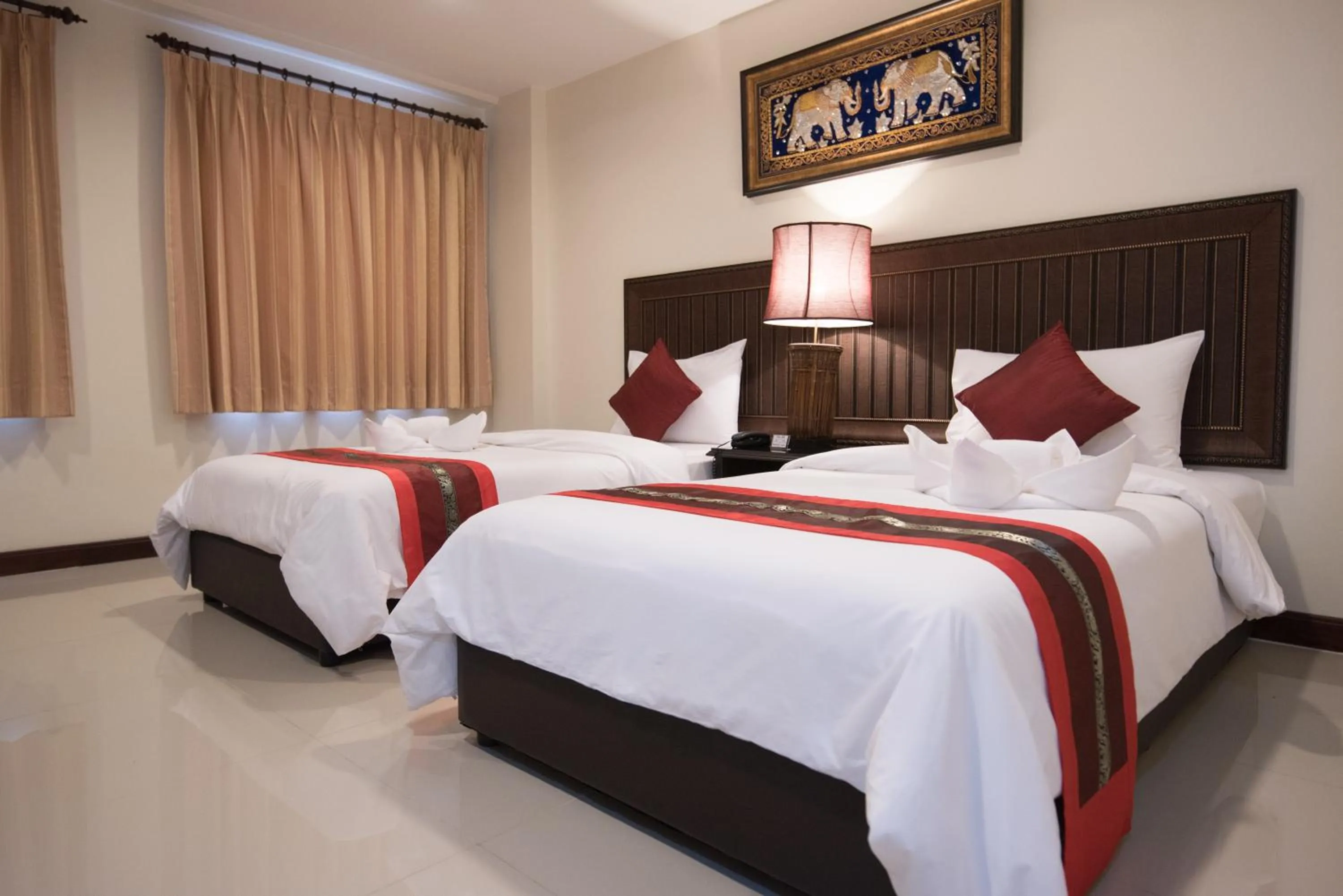 Bed in True Siam Rangnam Hotel