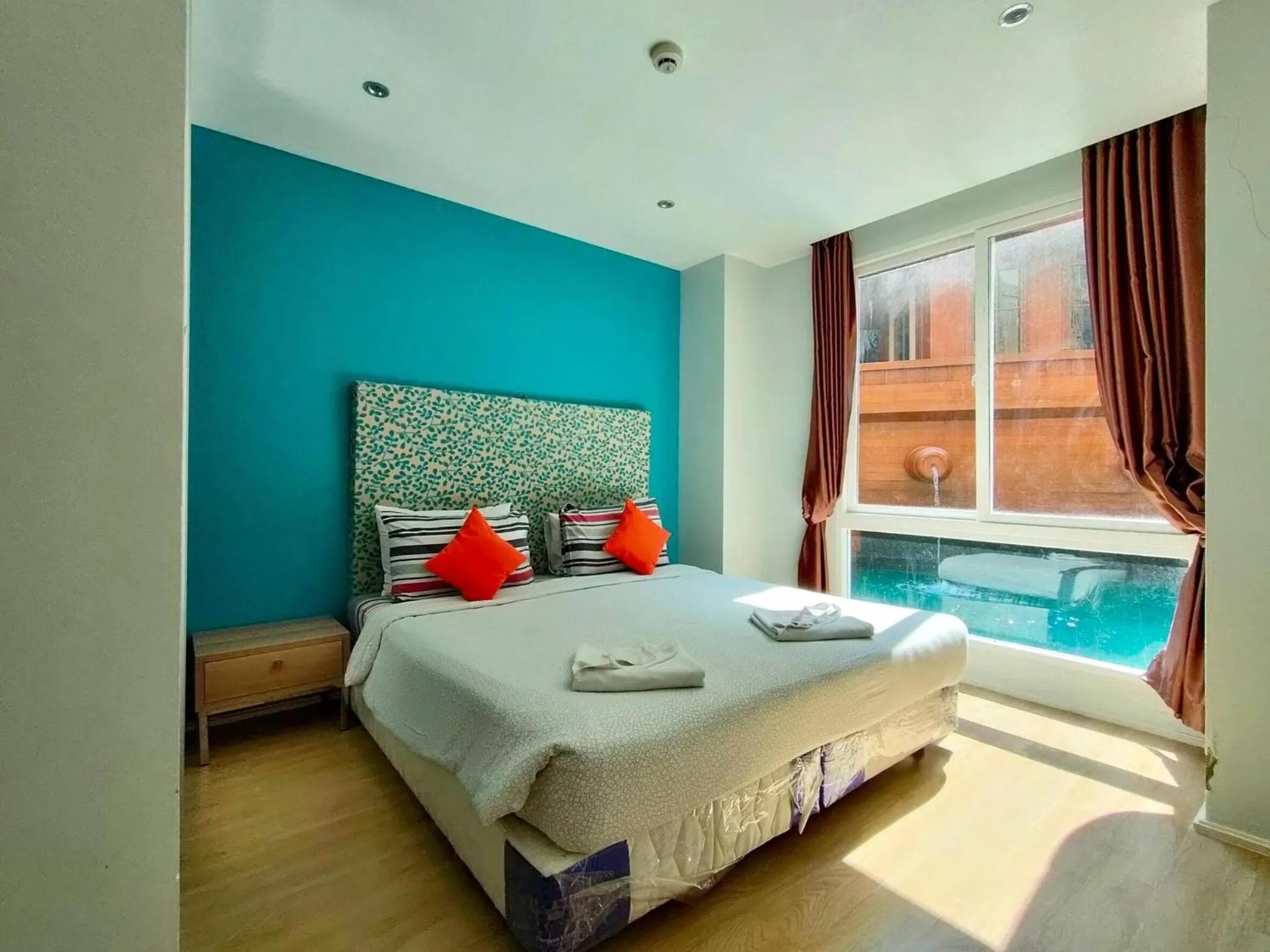 Bed in Atlantic Condo Resort Pattaya by Panisara