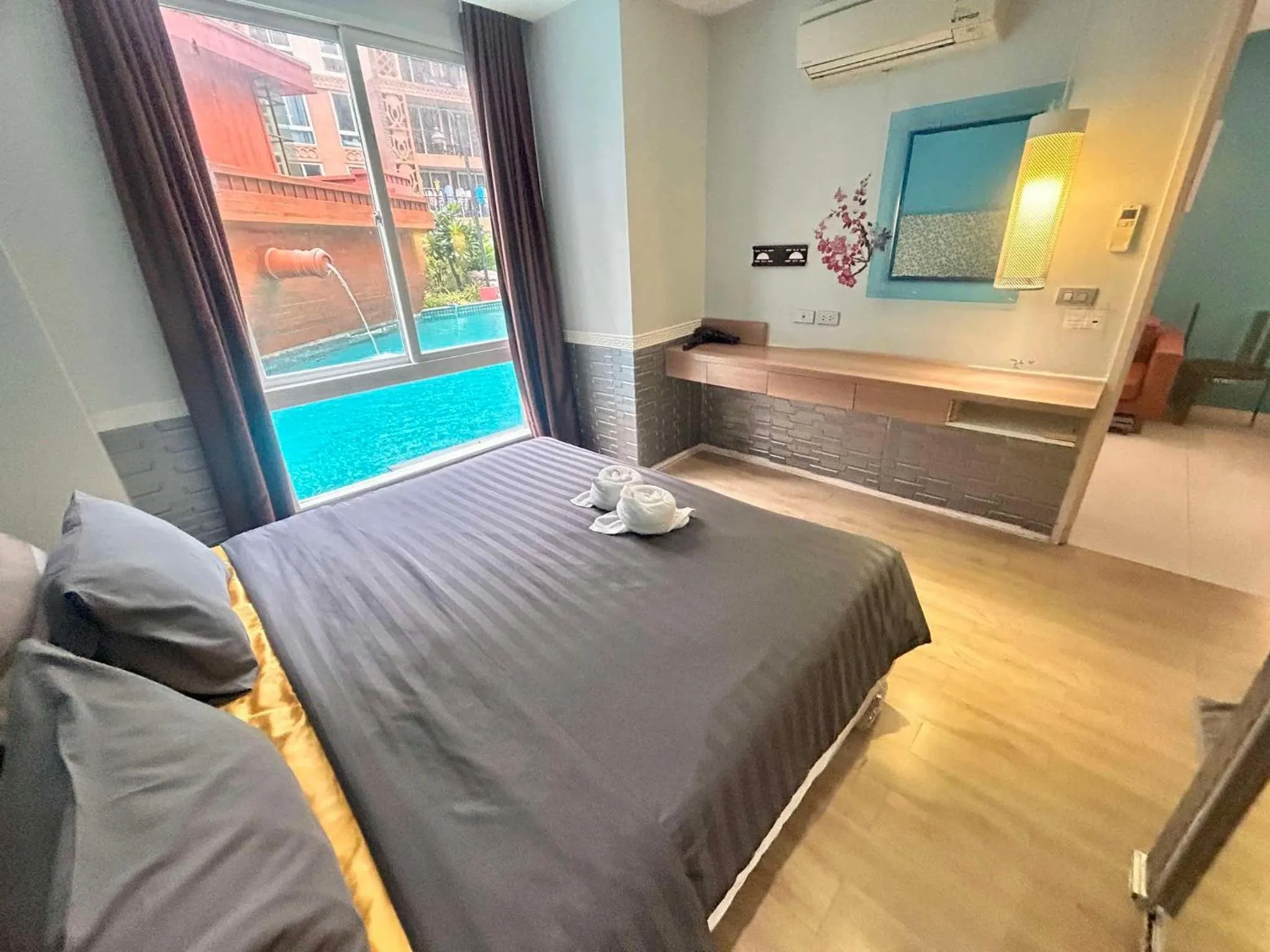 Bed in Atlantic Condo Resort Pattaya by Panisara