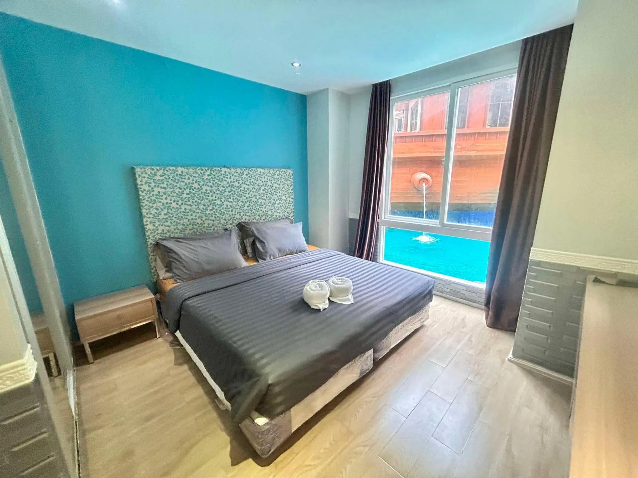 Bed in Atlantic Condo Resort Pattaya by Panisara