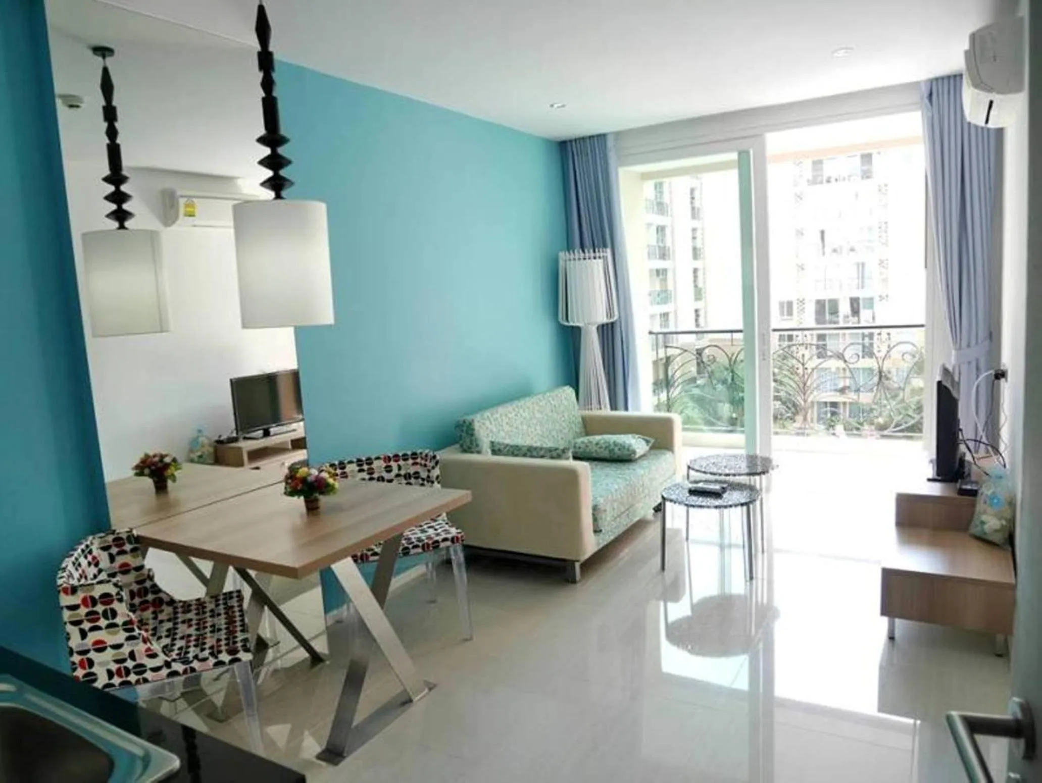 Living room in Atlantic Condo Resort Pattaya by Panisara