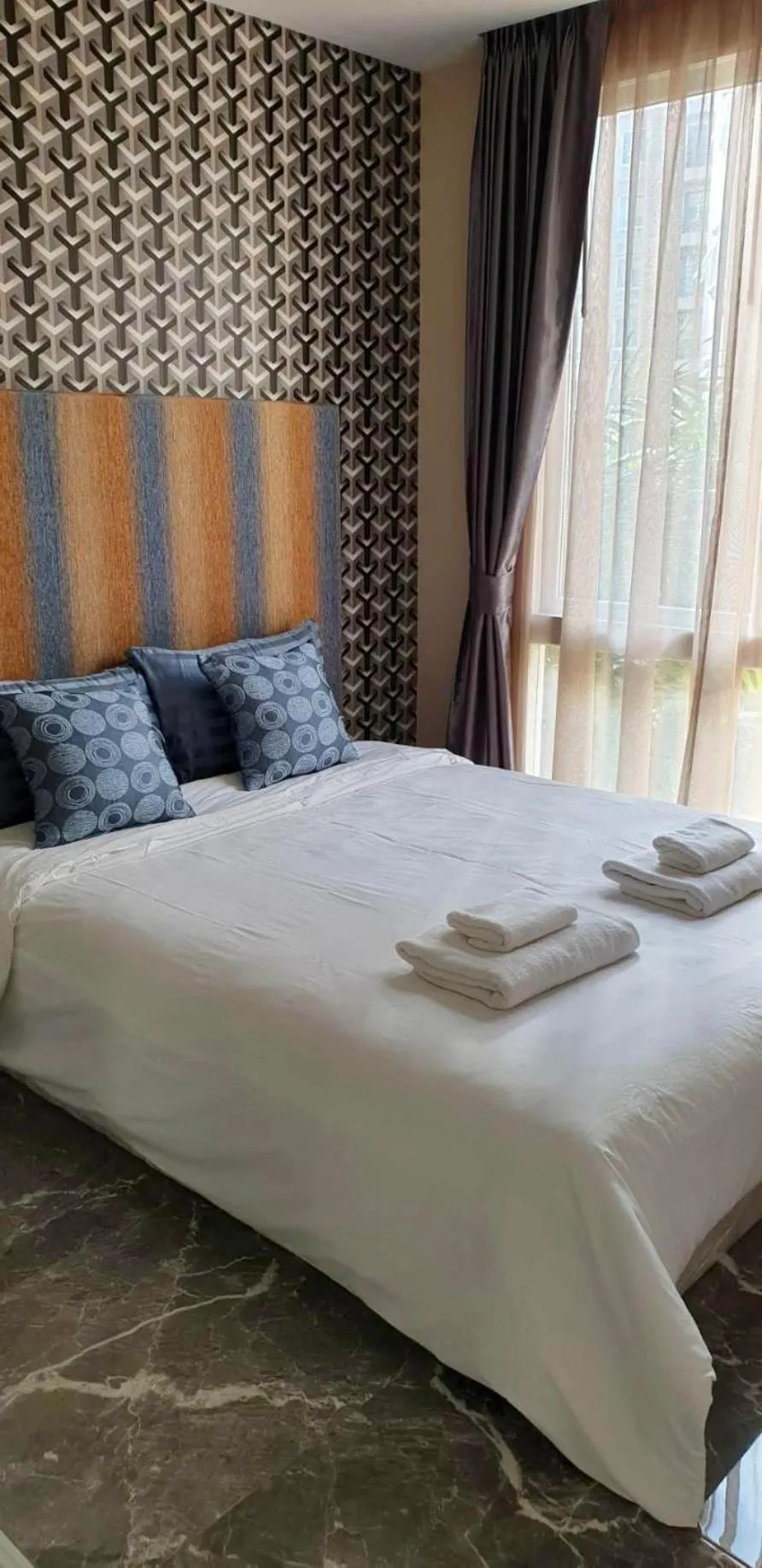 Bed in Atlantic Condo Resort Pattaya by Panisara