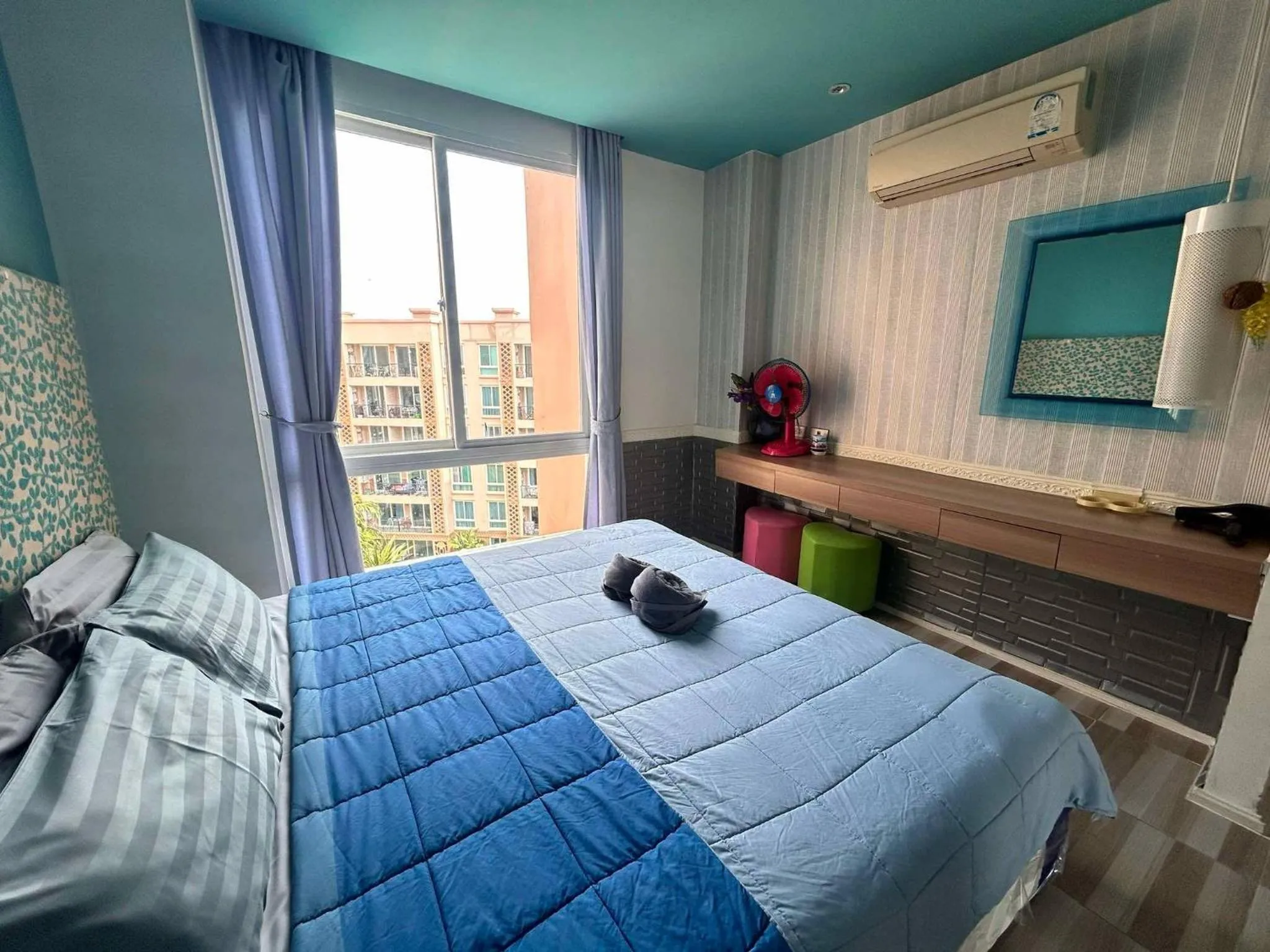 Bed in Atlantic Condo Resort Pattaya by Panisara