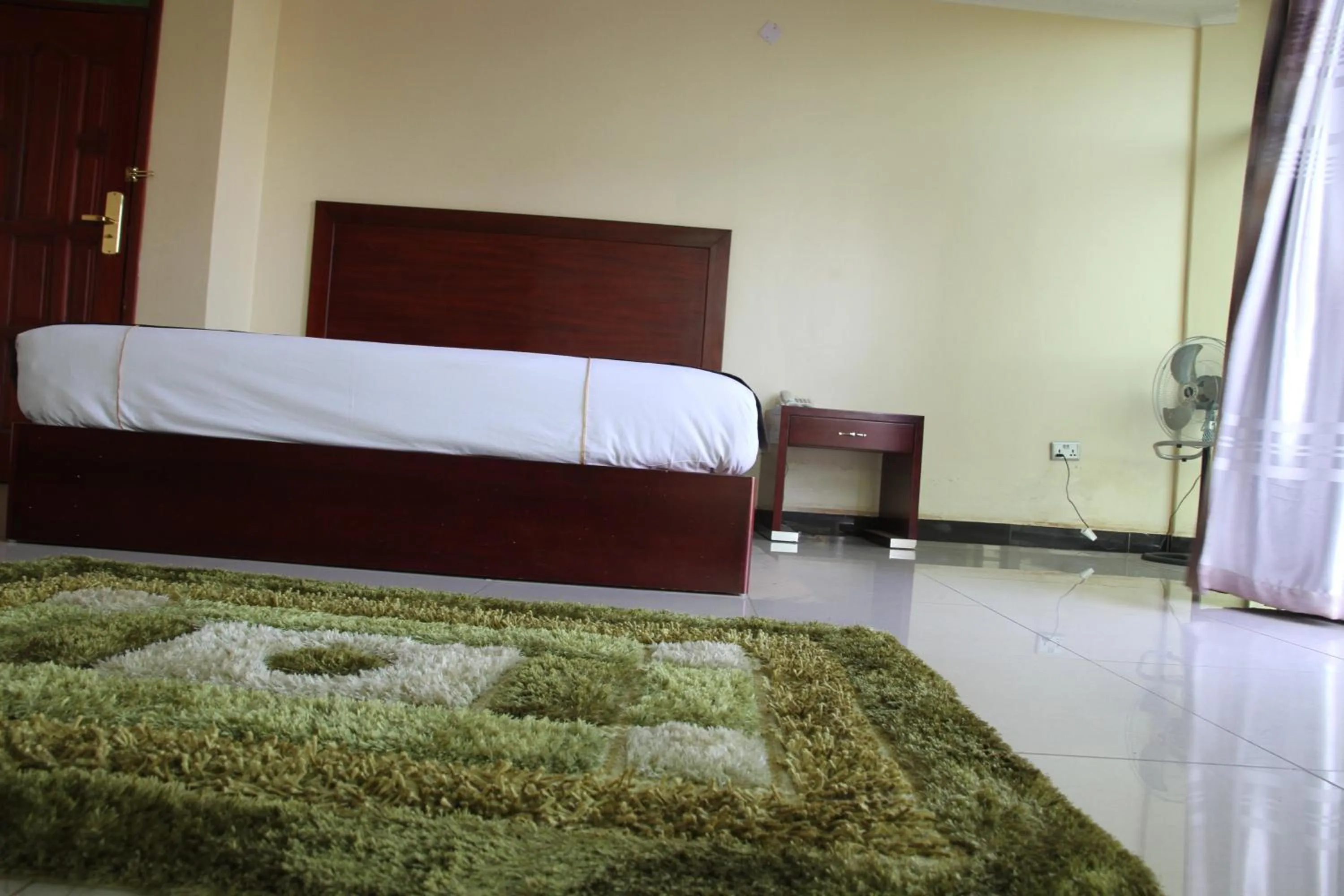 Bed in Namayiba Park Hotel Kampala