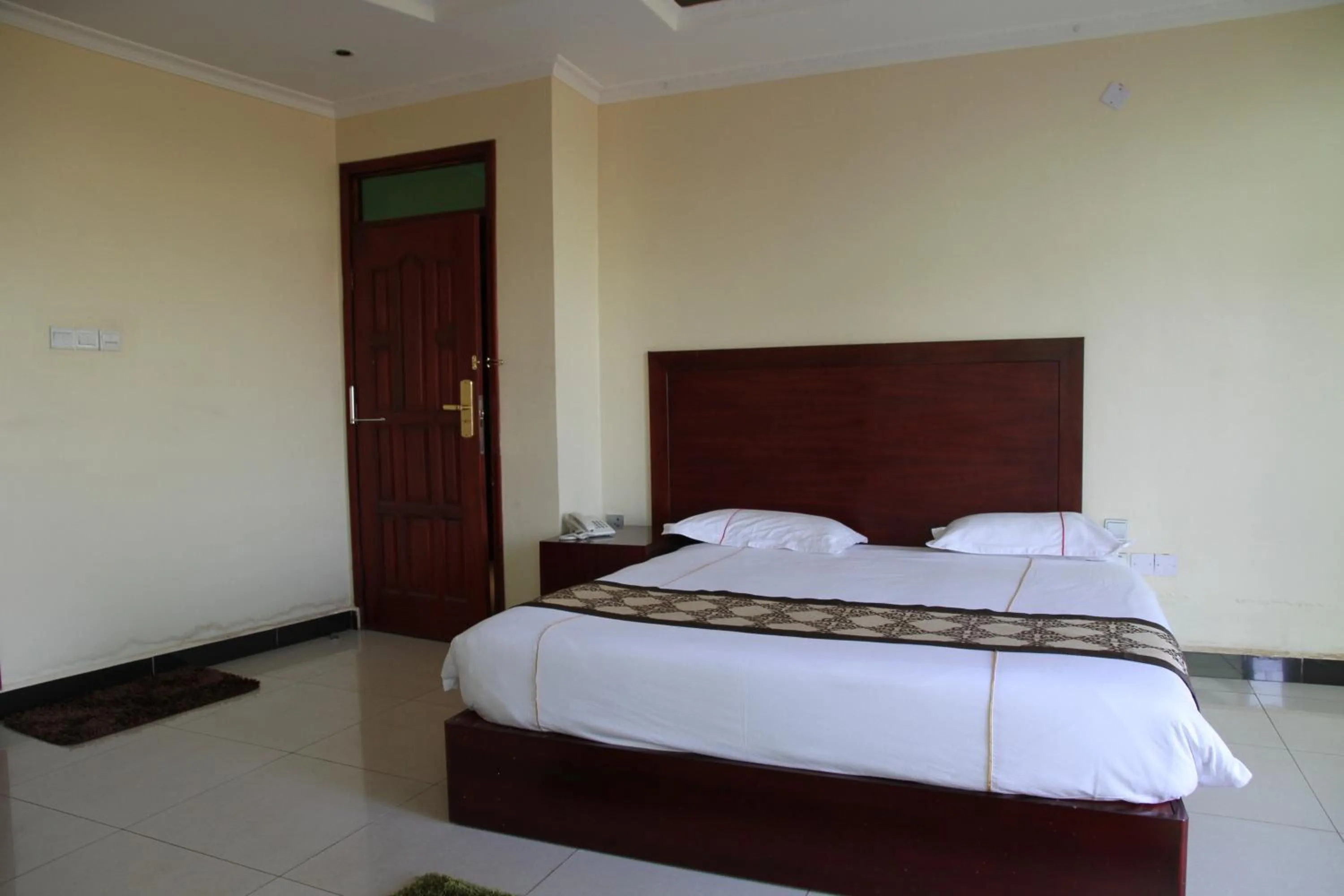 Bed in Namayiba Park Hotel Kampala