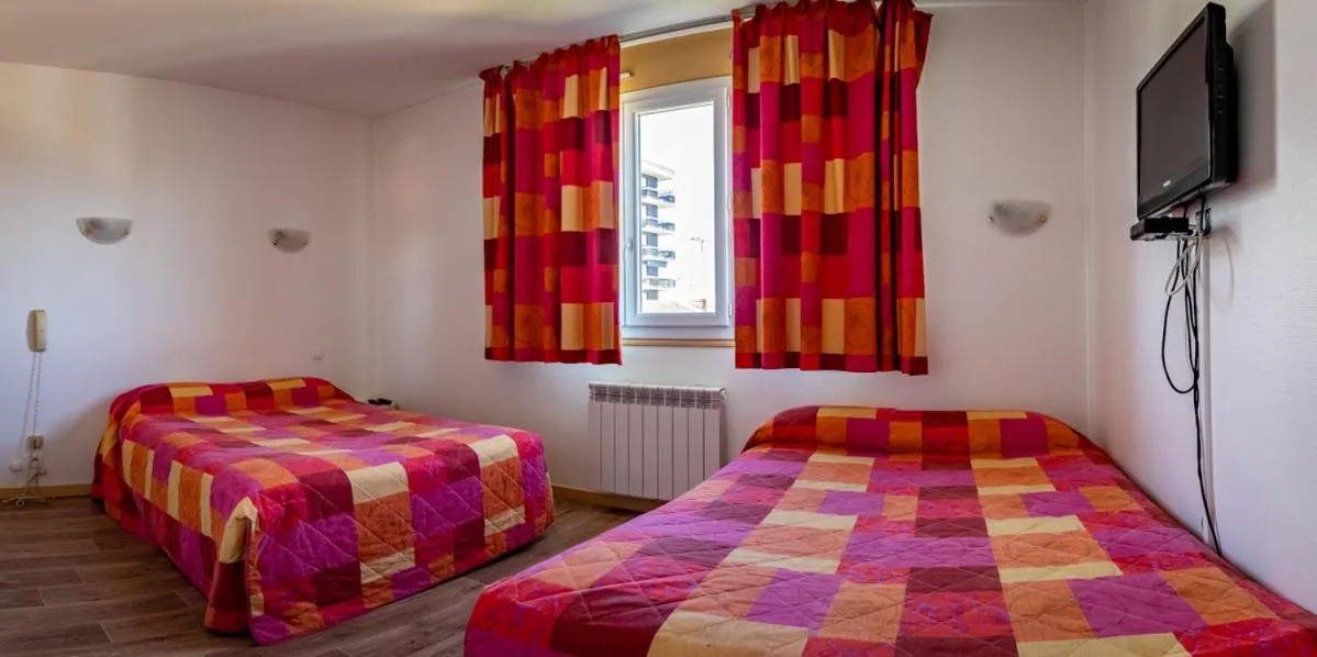 Bed in Hotel Le Boischaut - Citotel Chateauroux