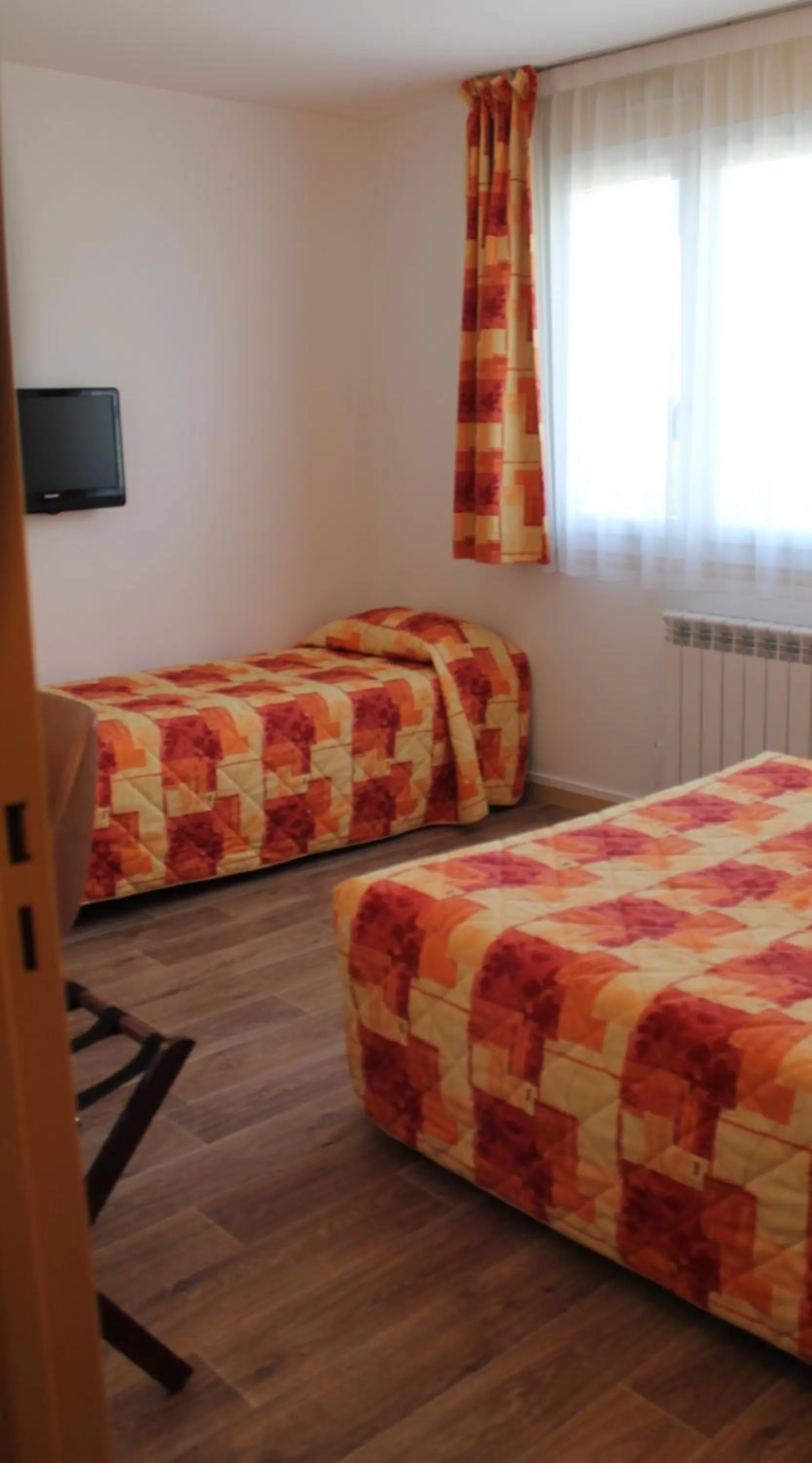 Photo of the whole room, Bed in Hotel Le Boischaut - Citotel Chateauroux