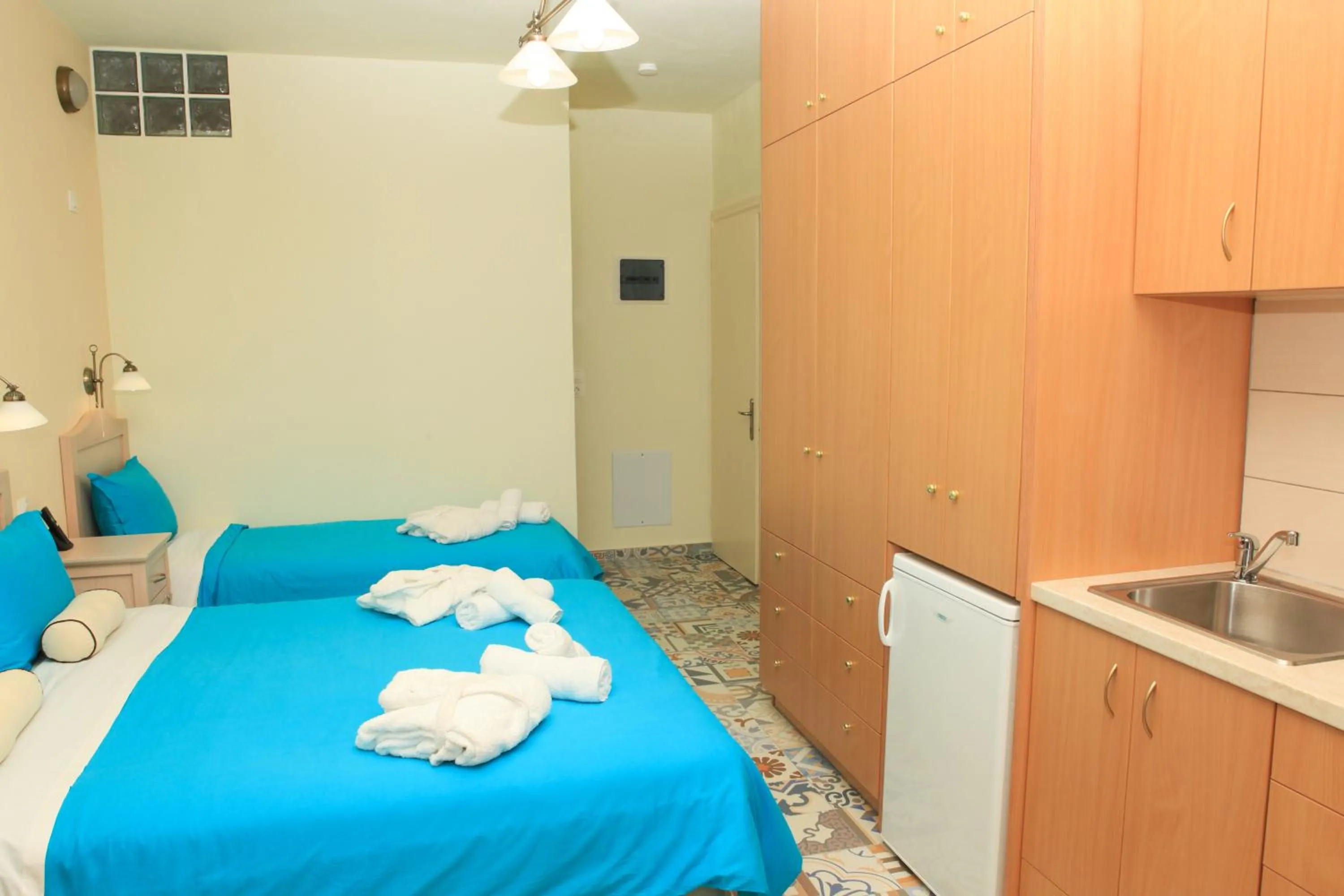 Bed in Stafylos Suites & Boutique hotel