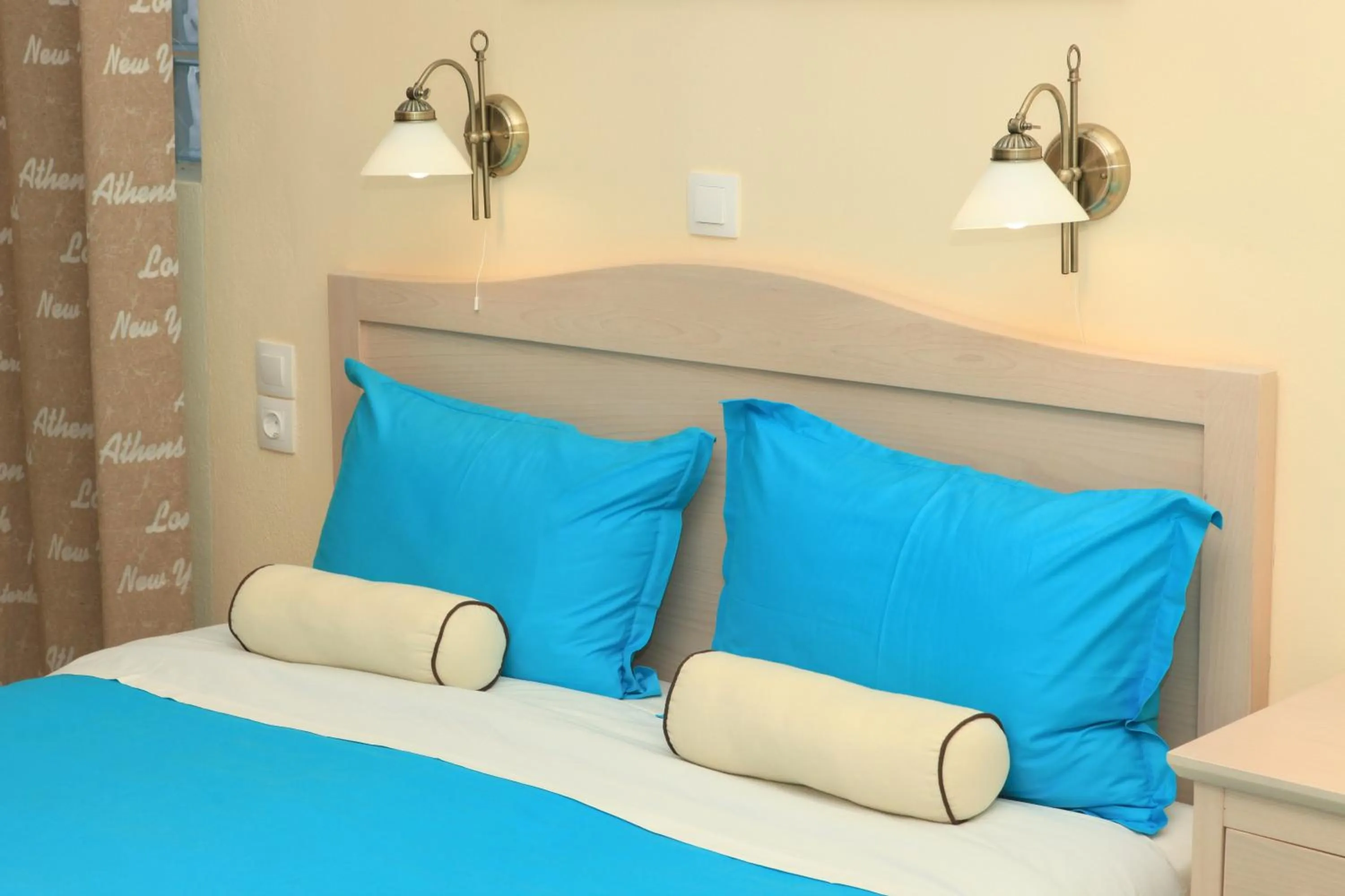 Bed in Stafylos Suites & Boutique hotel