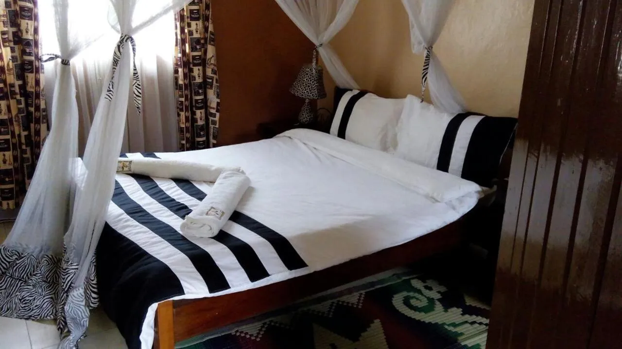 Bed in Kivu Resort