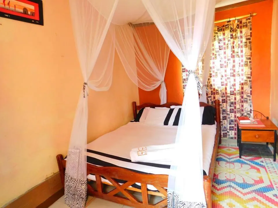 Bed in Kivu Resort