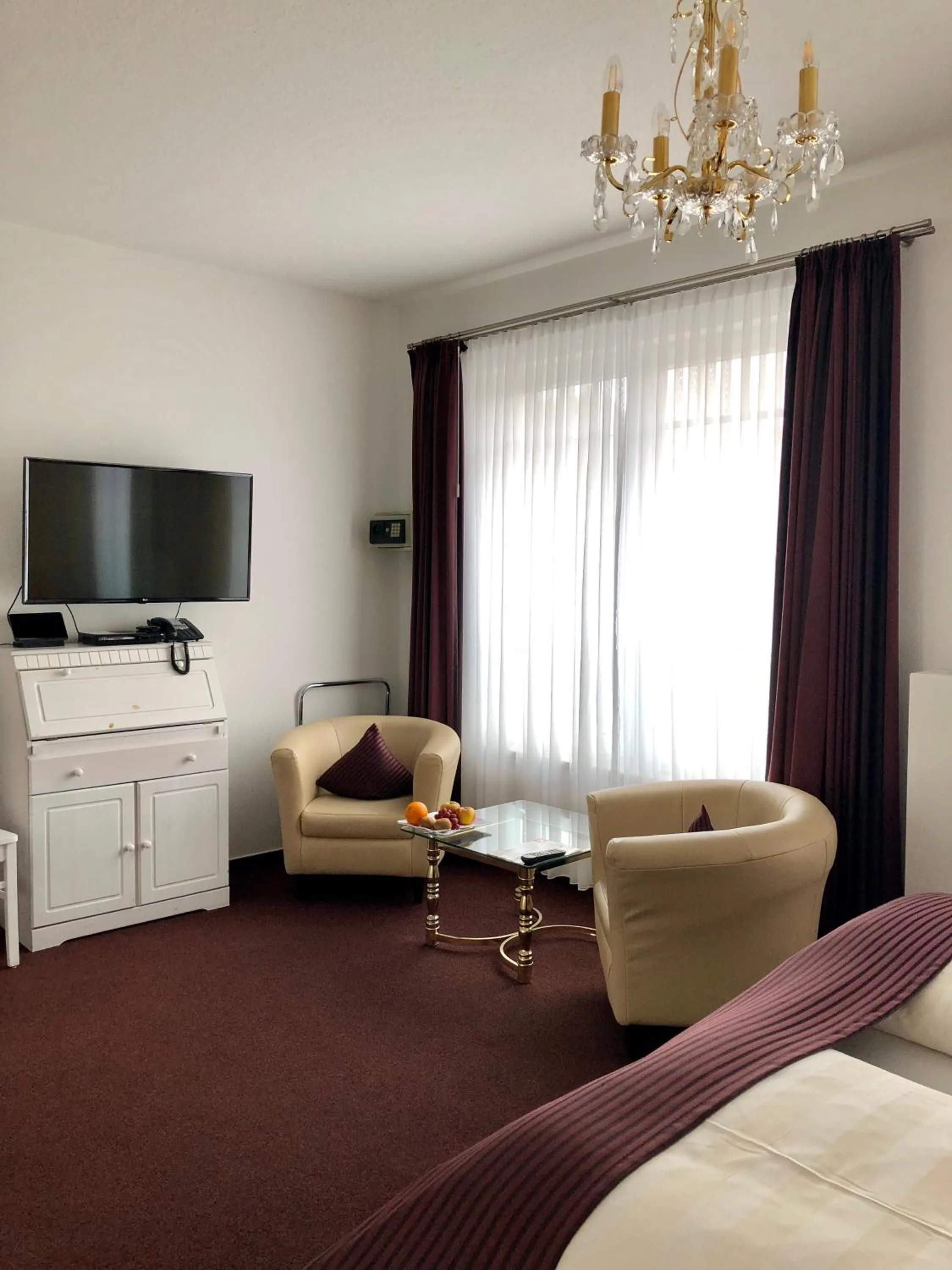 Photo of the whole room, Bed in Hotel Sylter Blaumuschel