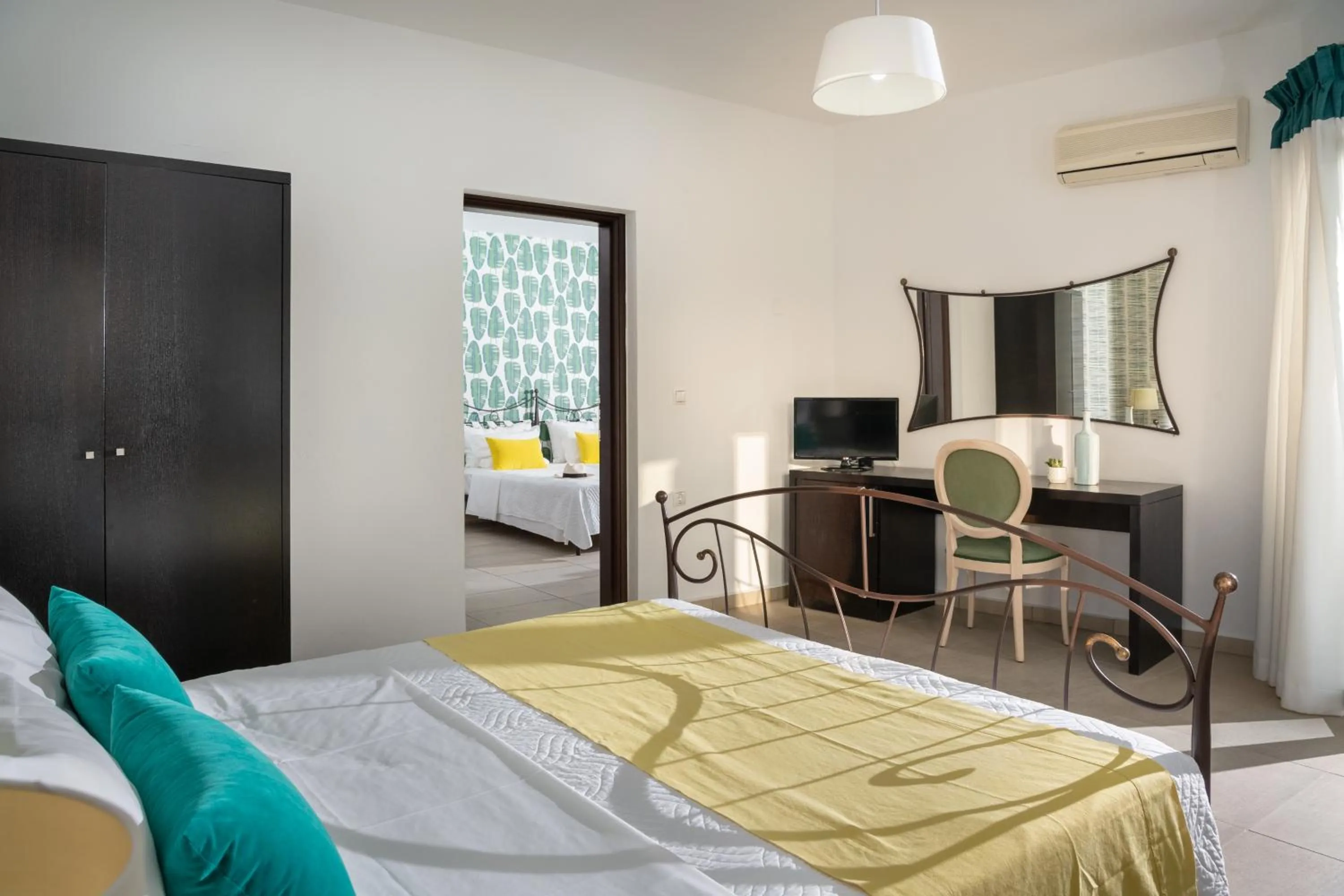 Bed in Angela Studios Apartments