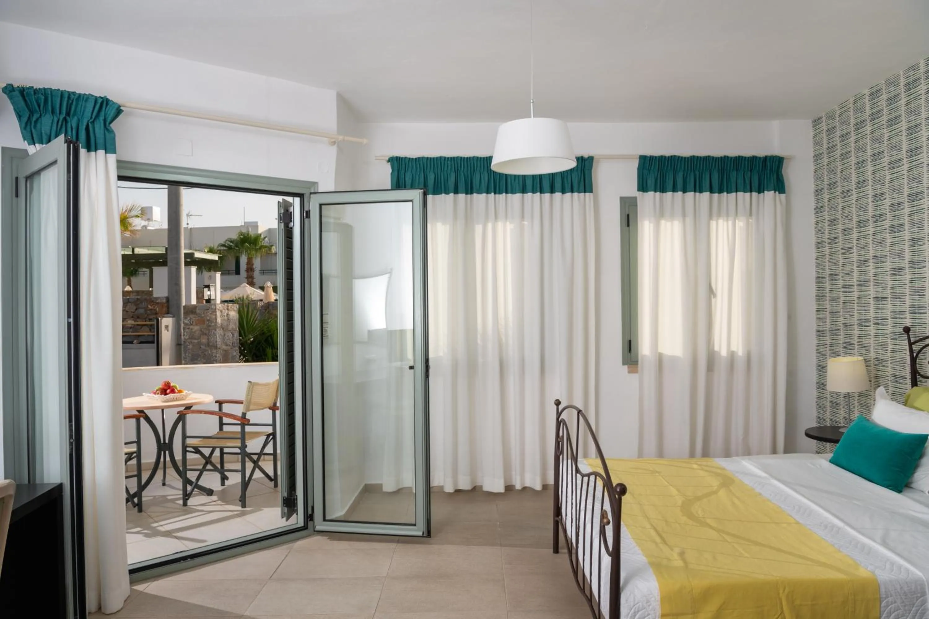 Bed in Angela Studios Apartments