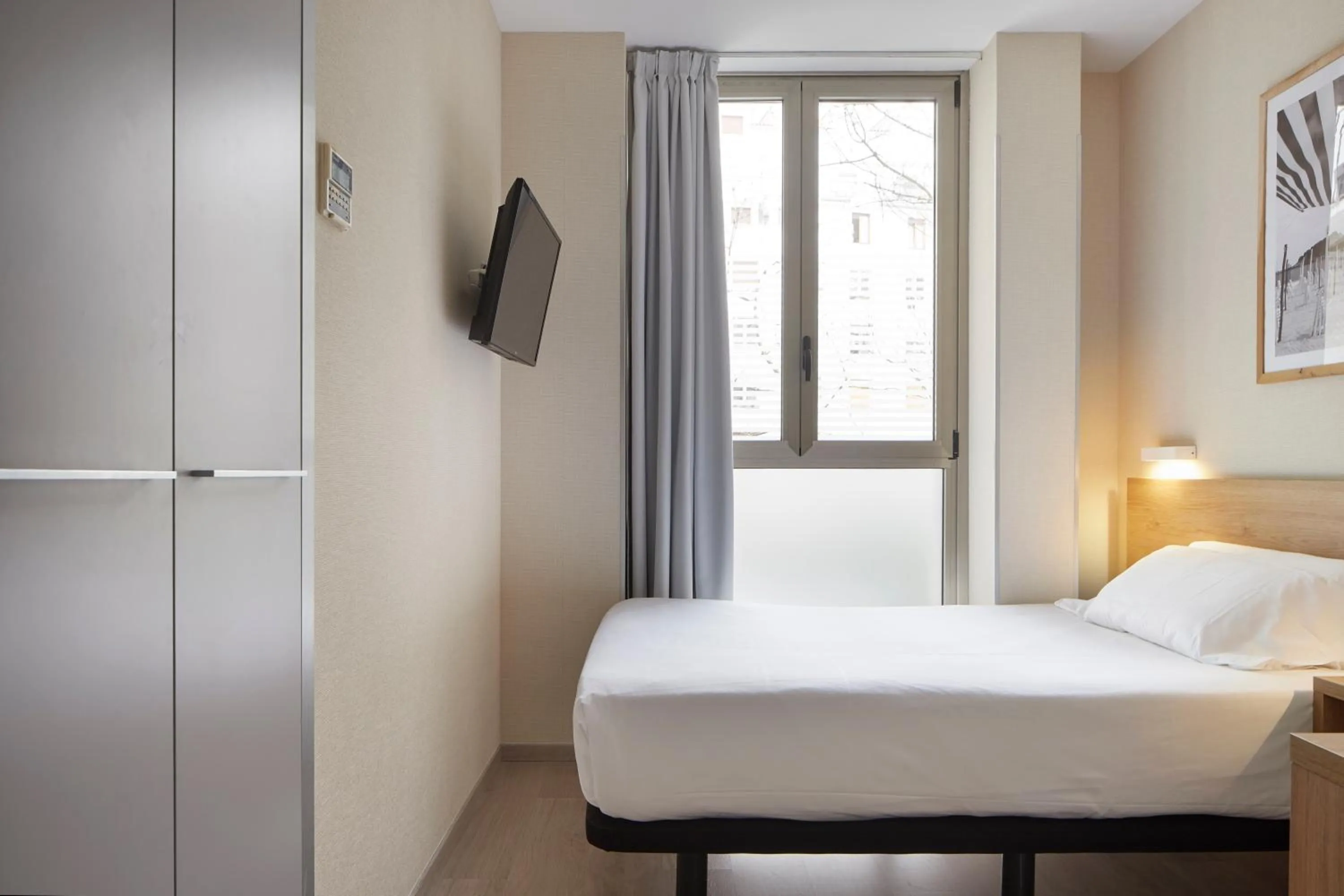 Bed in Welcome Gros Hotel