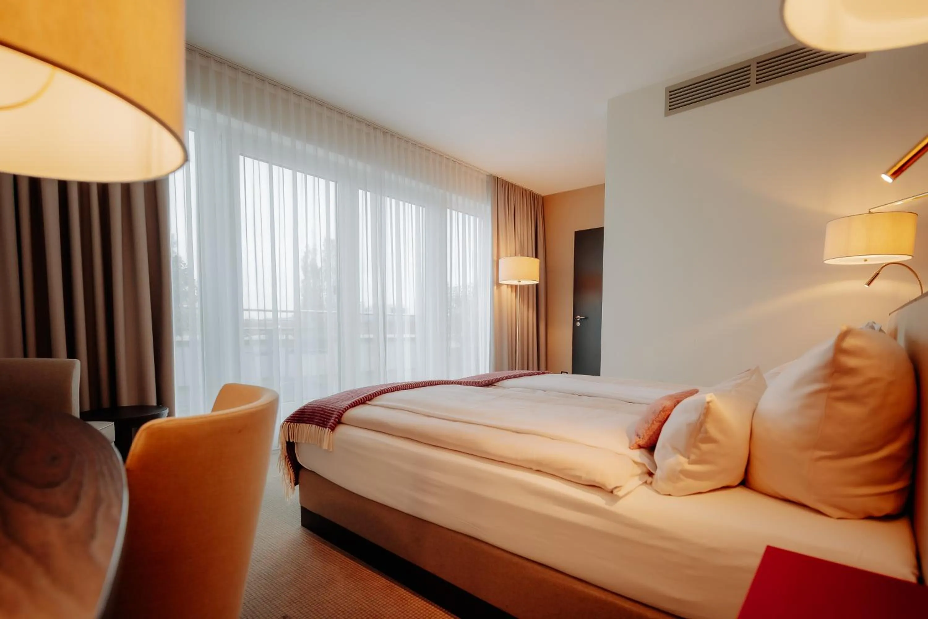 Photo of the whole room, Bed in LOOKEN INN Lingen by Hackmann