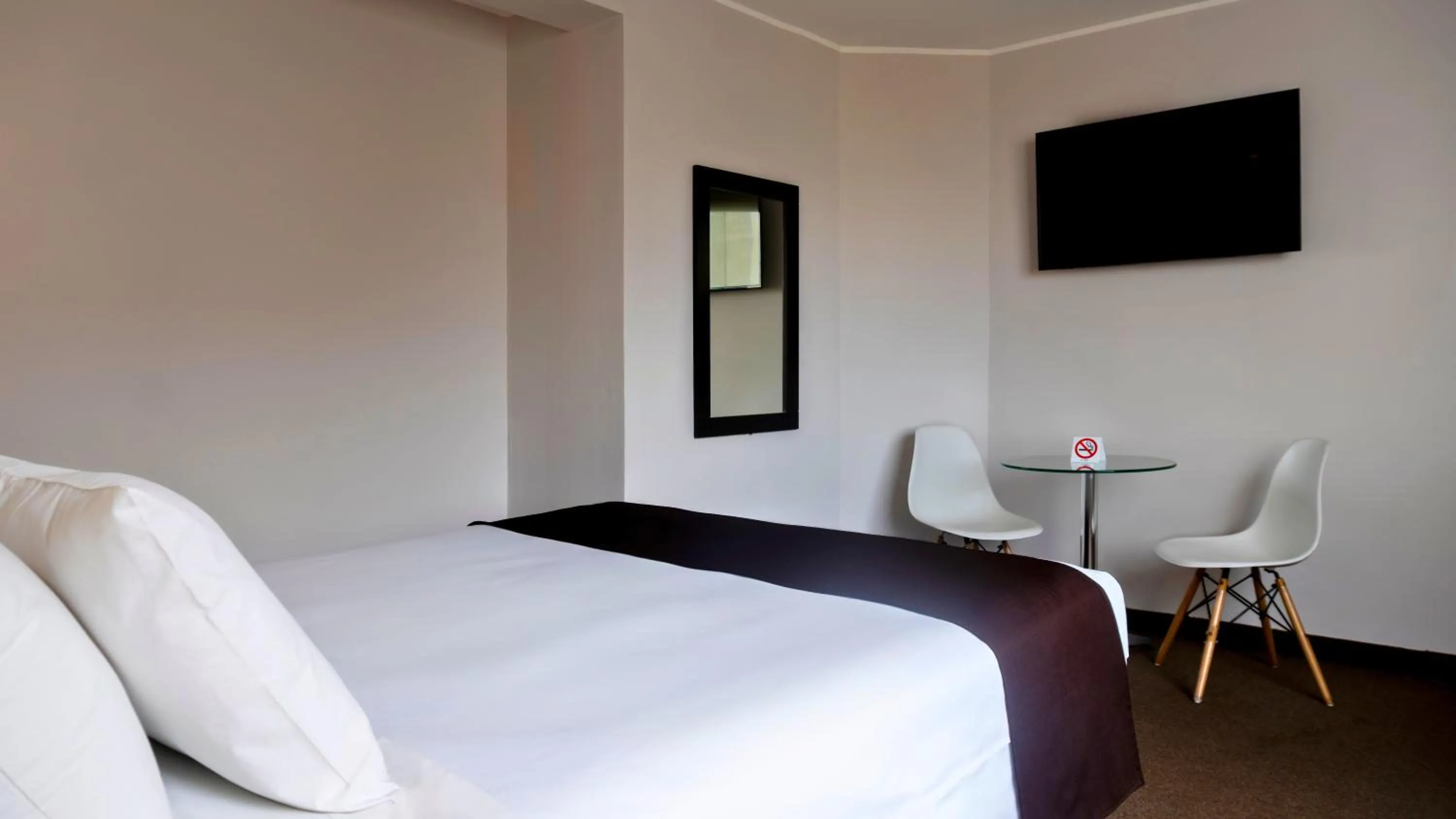 Bed in Hotel Ferré Miraflores