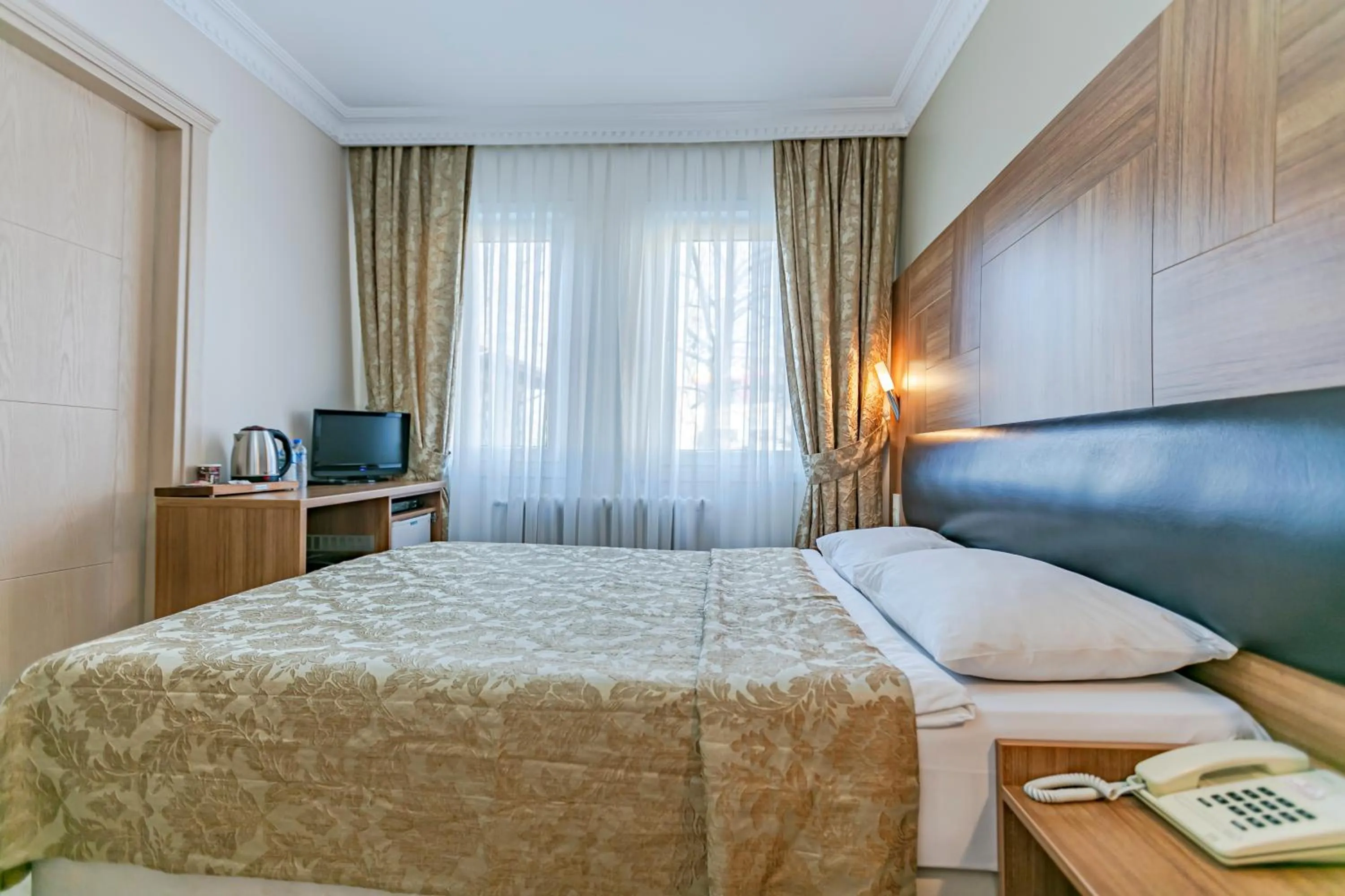 Bed in Elasophia Hotel