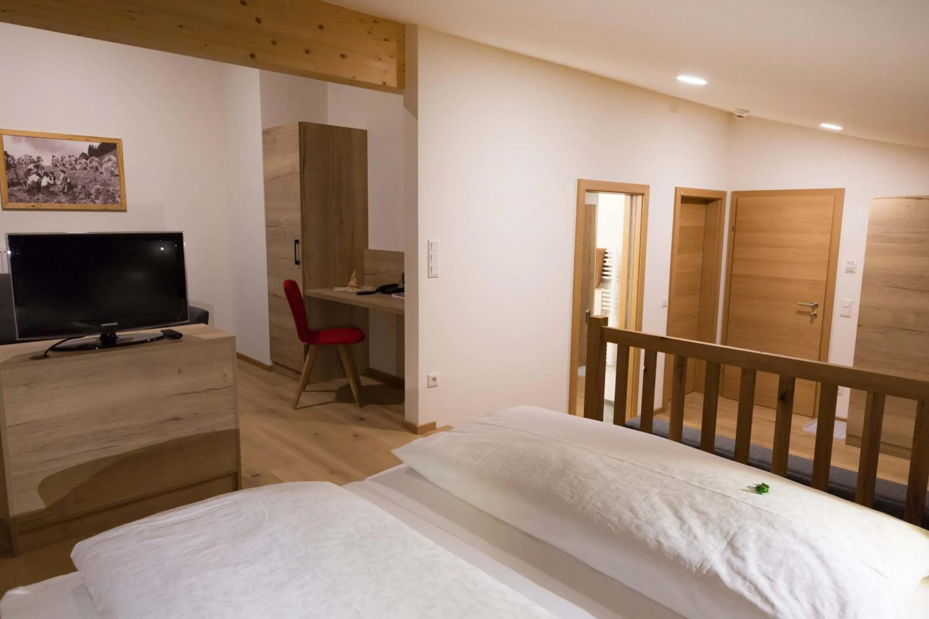 Living room, Bed in Hotel Rosner