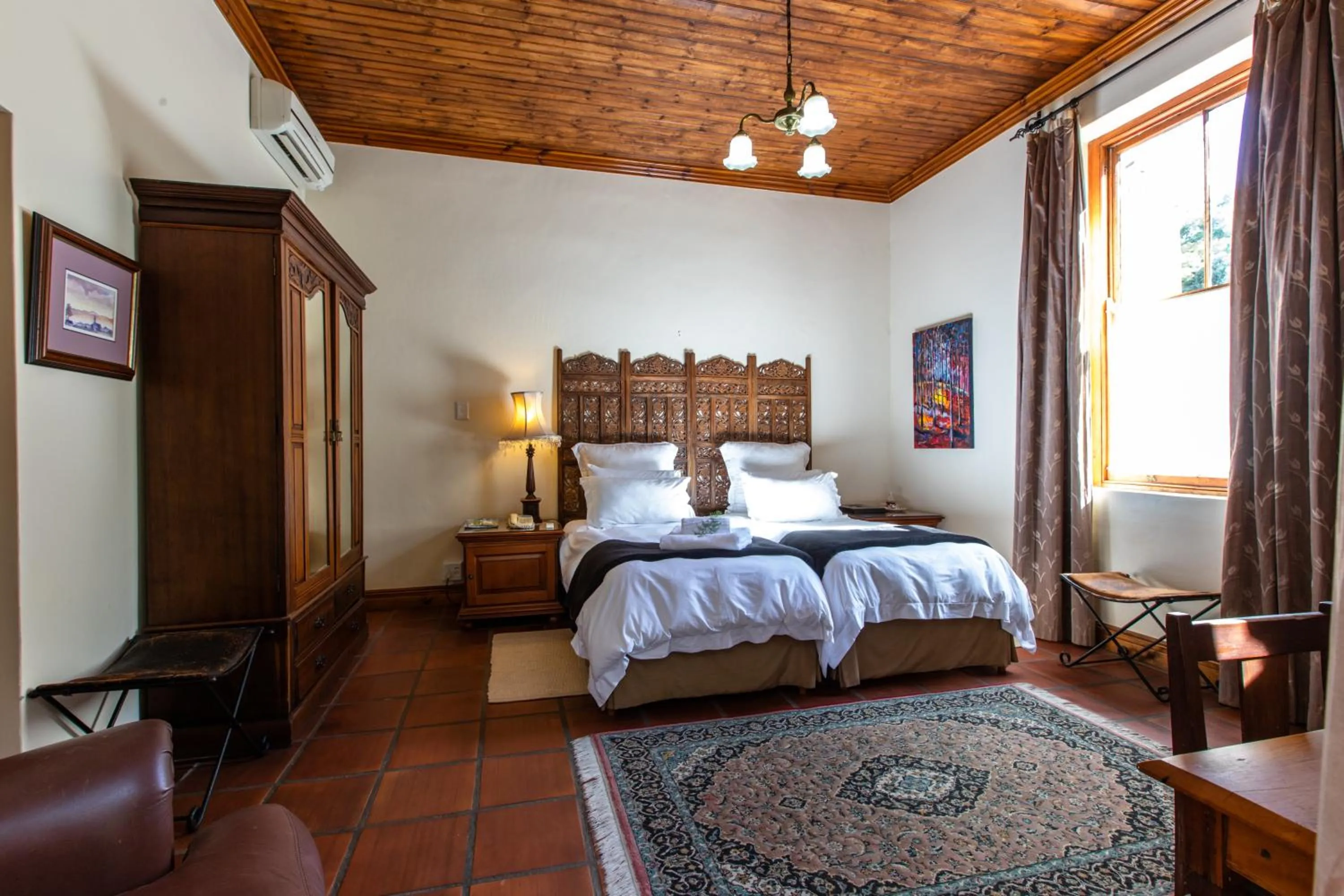 Bed in Evergreen Manor and Spa