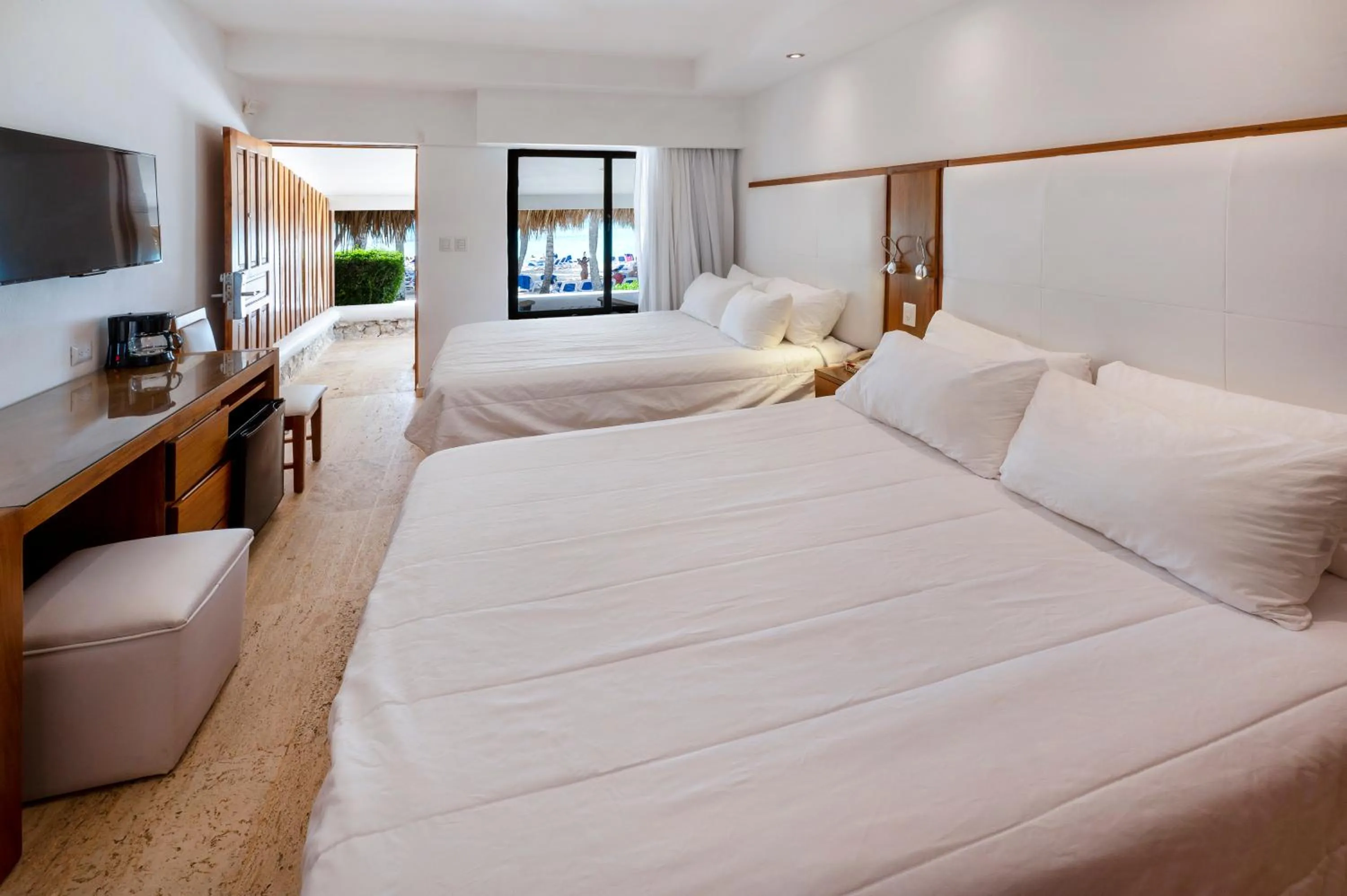 Bed in Viva Dominicus Beach by Wyndham, A Trademark All Inclusive