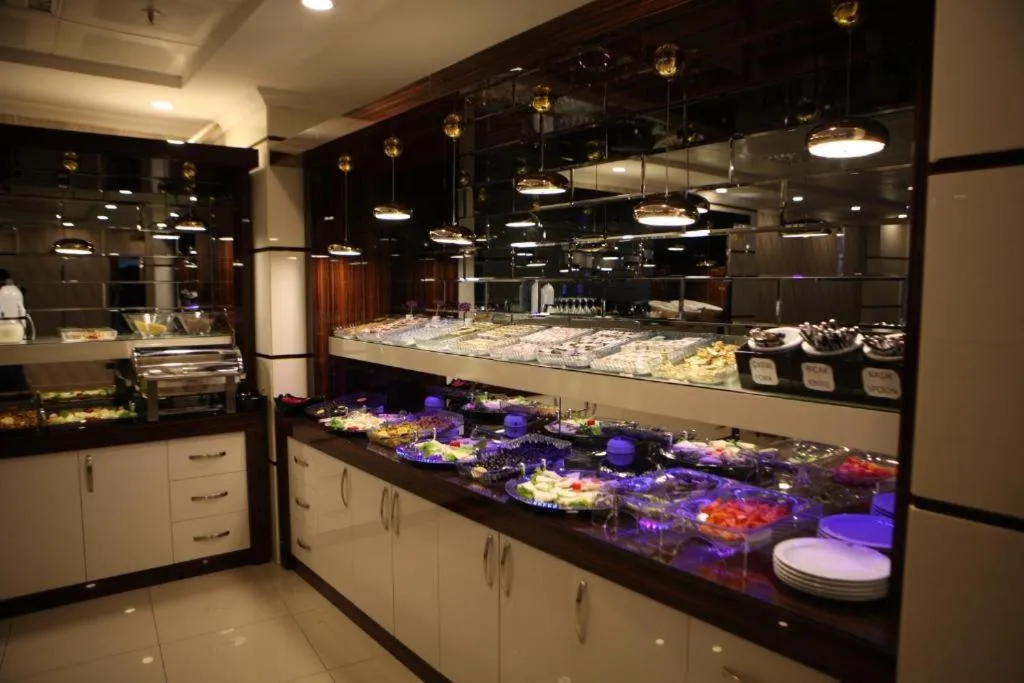 Kitchen or kitchenette in Gumus Palace Suites