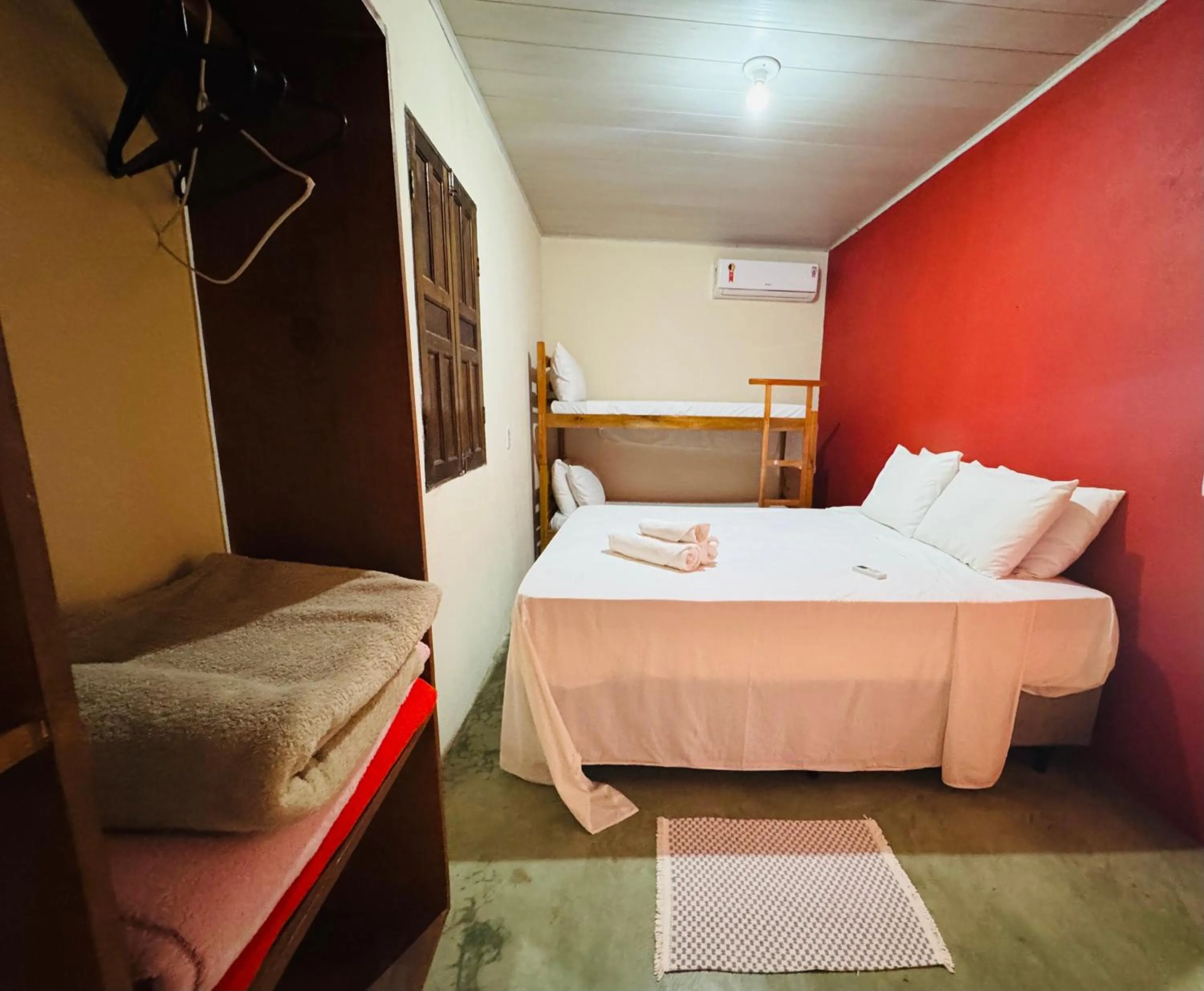 Bed in Pousada Aquarela