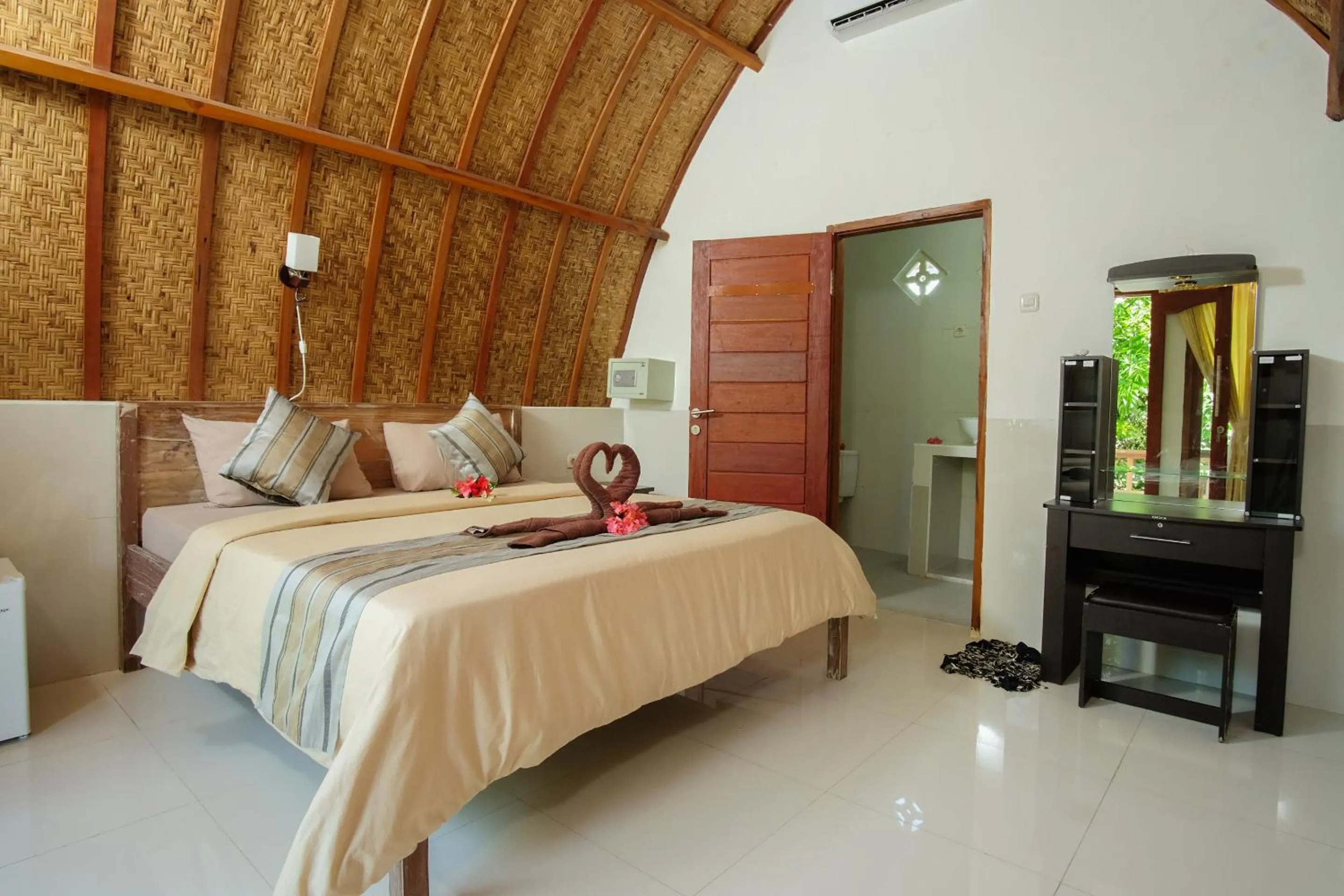 Bed in Warna Beach Hotel