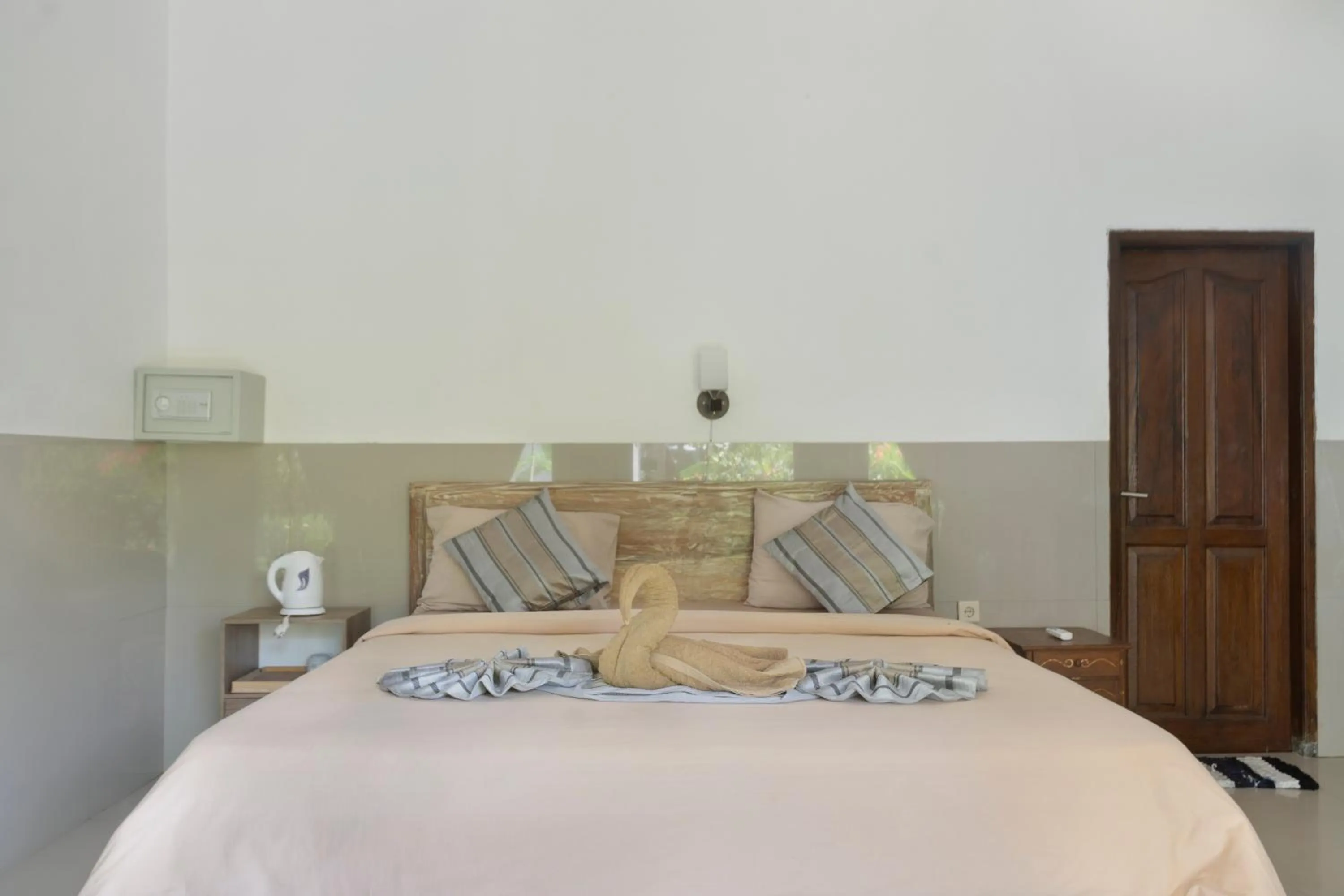 Bed in Warna Beach Hotel