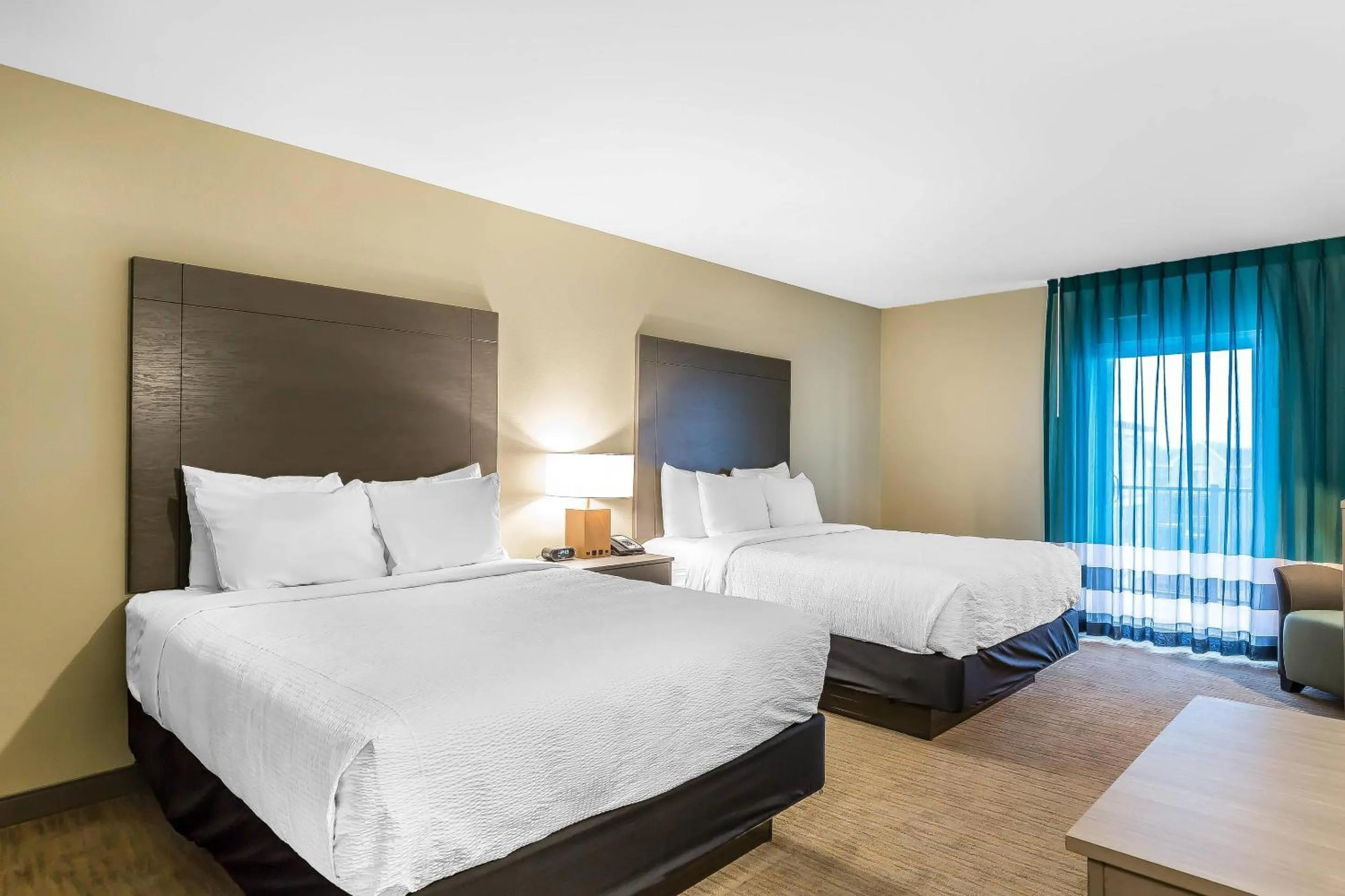 Deluxe Queen Room with Two Queen Beds and Bay View - Non-Smoking in Marina Bay Hotel & Suites, an Ascend Collection Hotel