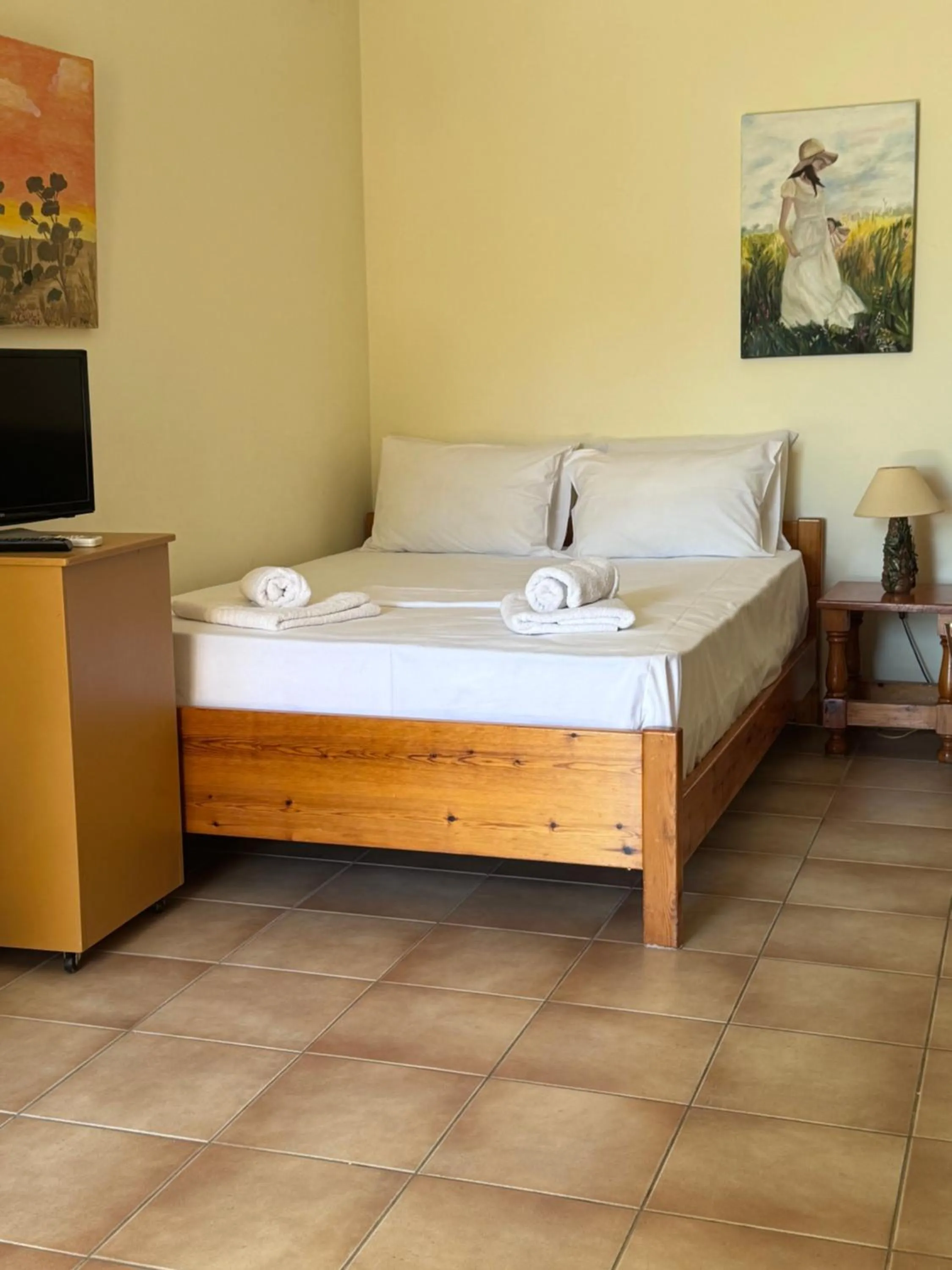 Bed in Verga Apartments & Suites