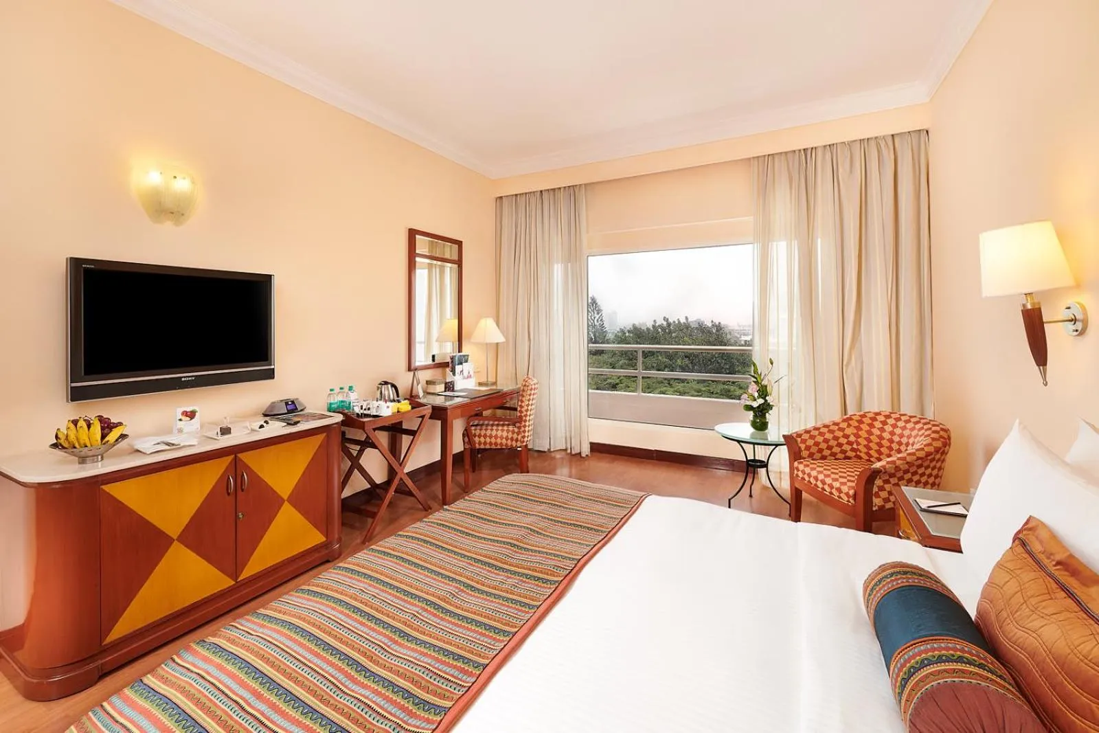 Bed in The Lalit Ashok