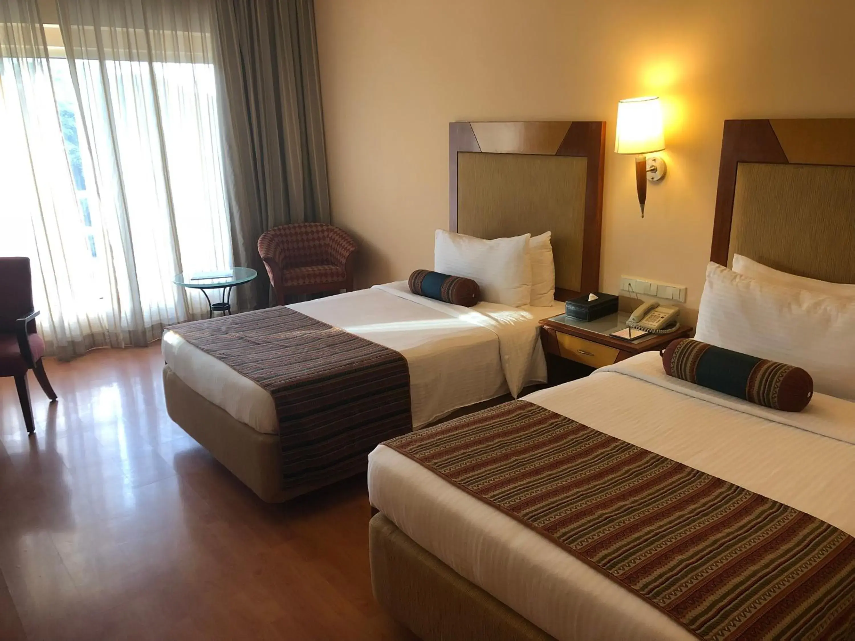 Twin Room with Pool View in The Lalit Ashok Twin Room with Pool View in The Lalit Ashok