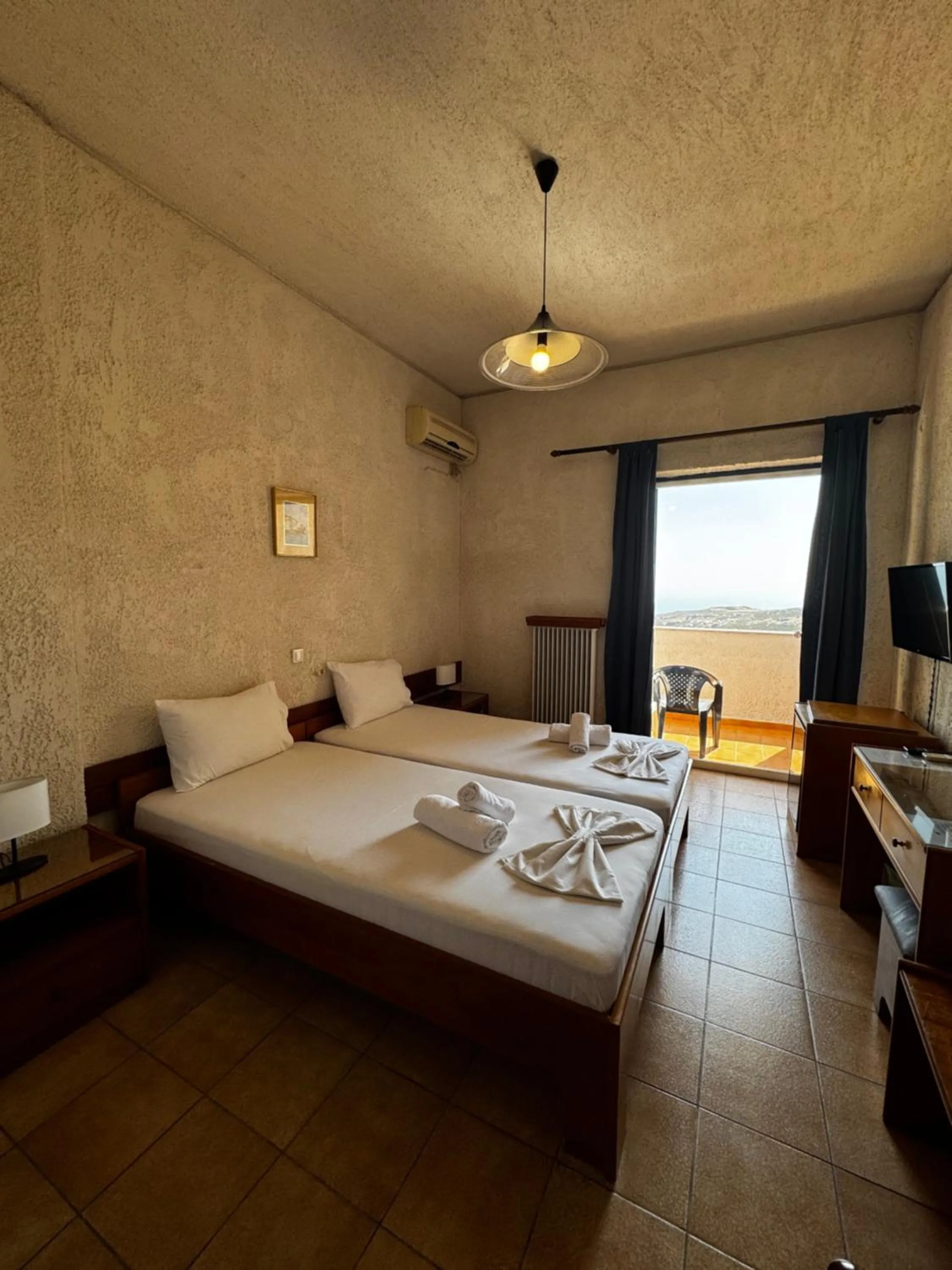 Bed in Sariza Spring Hotel