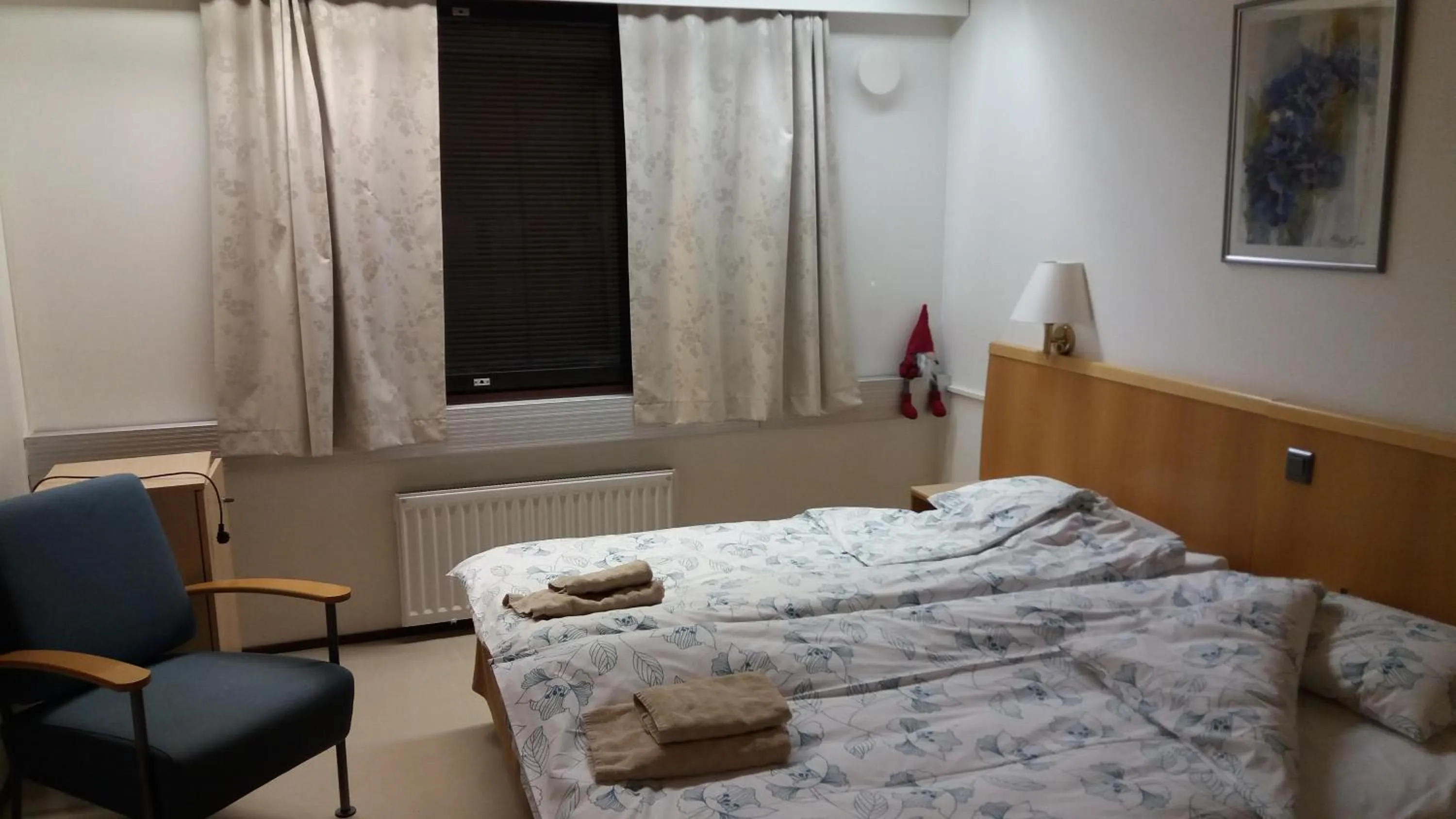 Communal lounge/ TV room, Bed in Vuotson Maja B&B