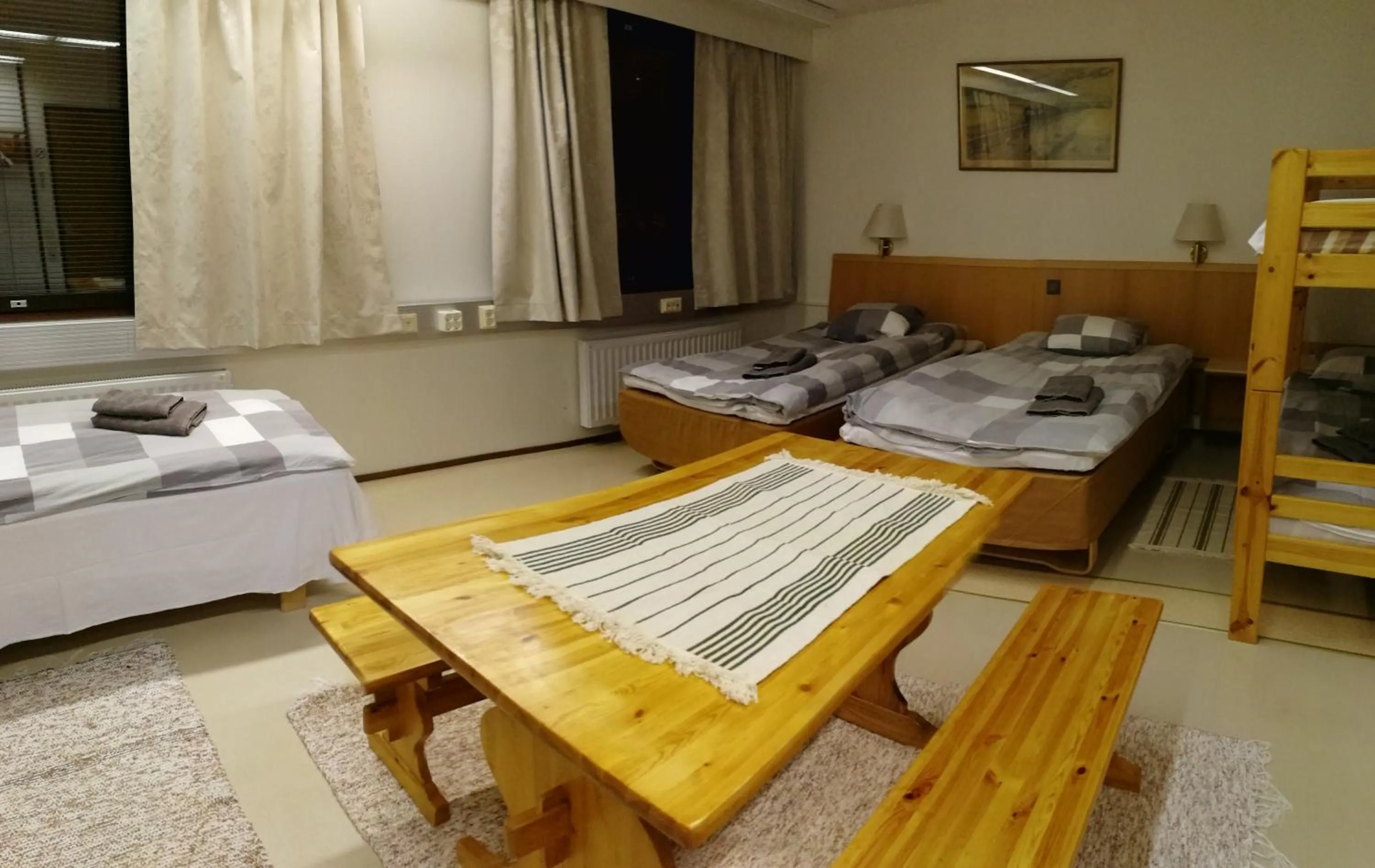 Communal lounge/ TV room, Bed in Vuotson Maja B&B